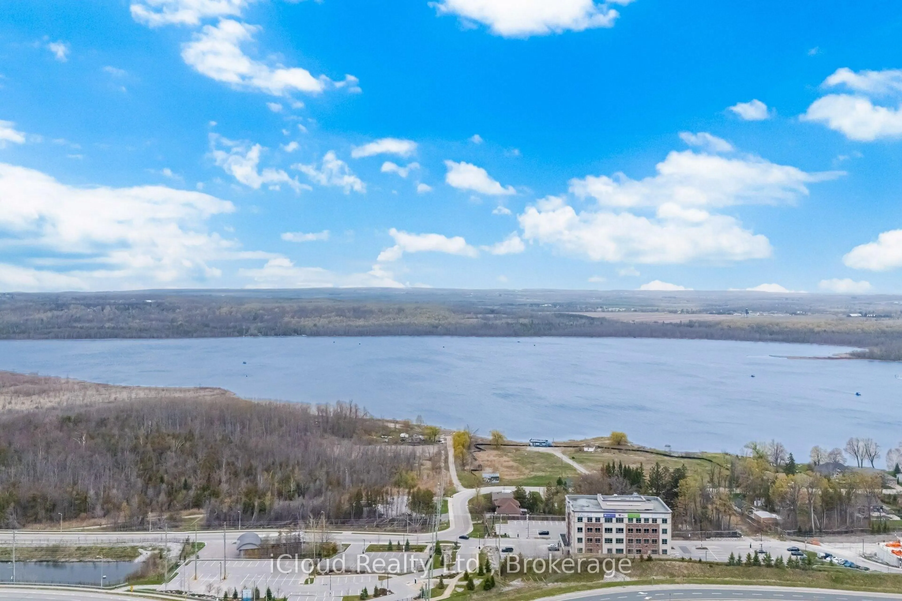 A pic from outside/outdoor area/front of a property/back of a property/a pic from drone, water/lake/river/ocean view for 295 Cundles Rd #208, Barrie Ontario L4M 0K8