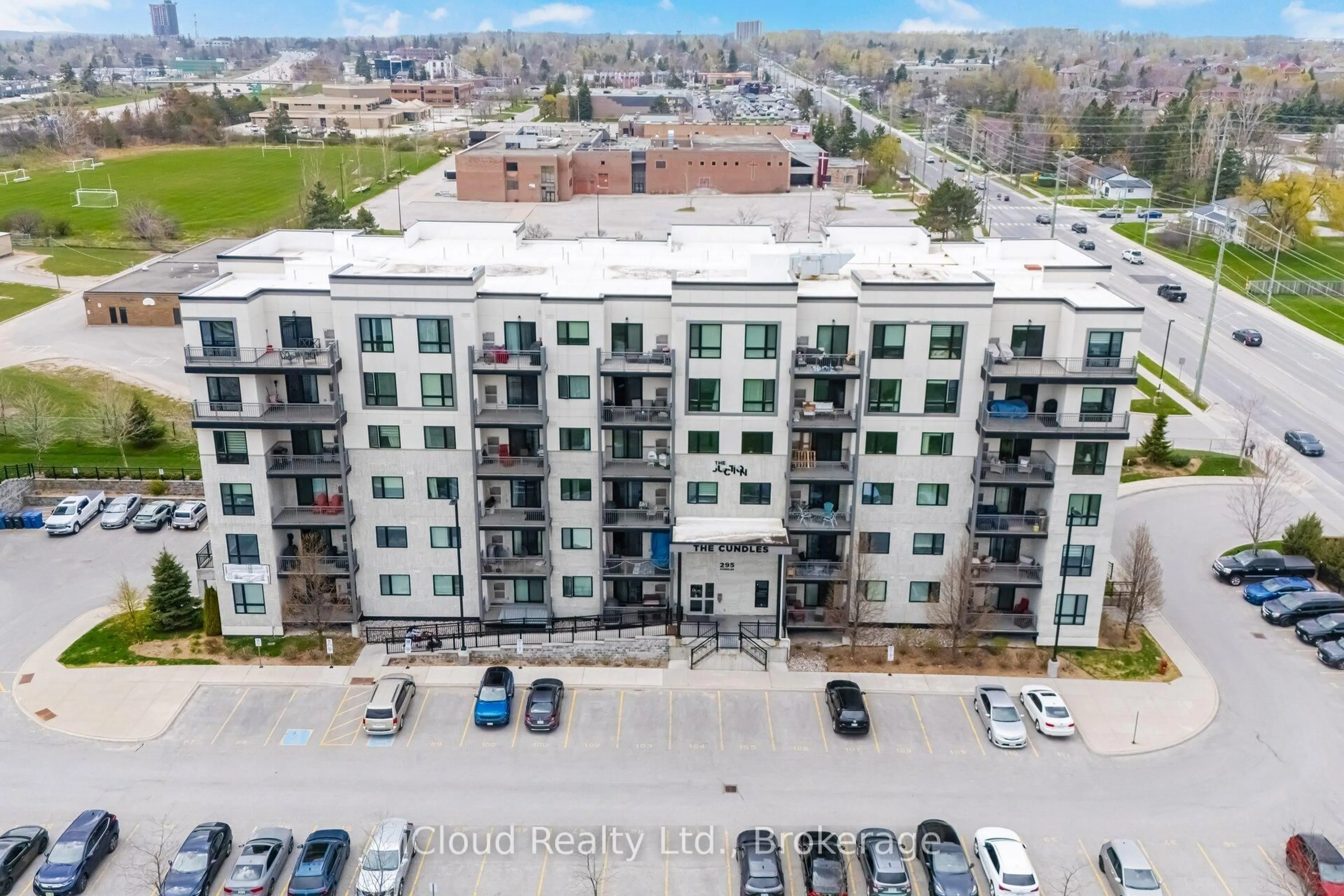 A pic from outside/outdoor area/front of a property/back of a property/a pic from drone, city buildings view from balcony for 295 Cundles Rd #208, Barrie Ontario L4M 0K8
