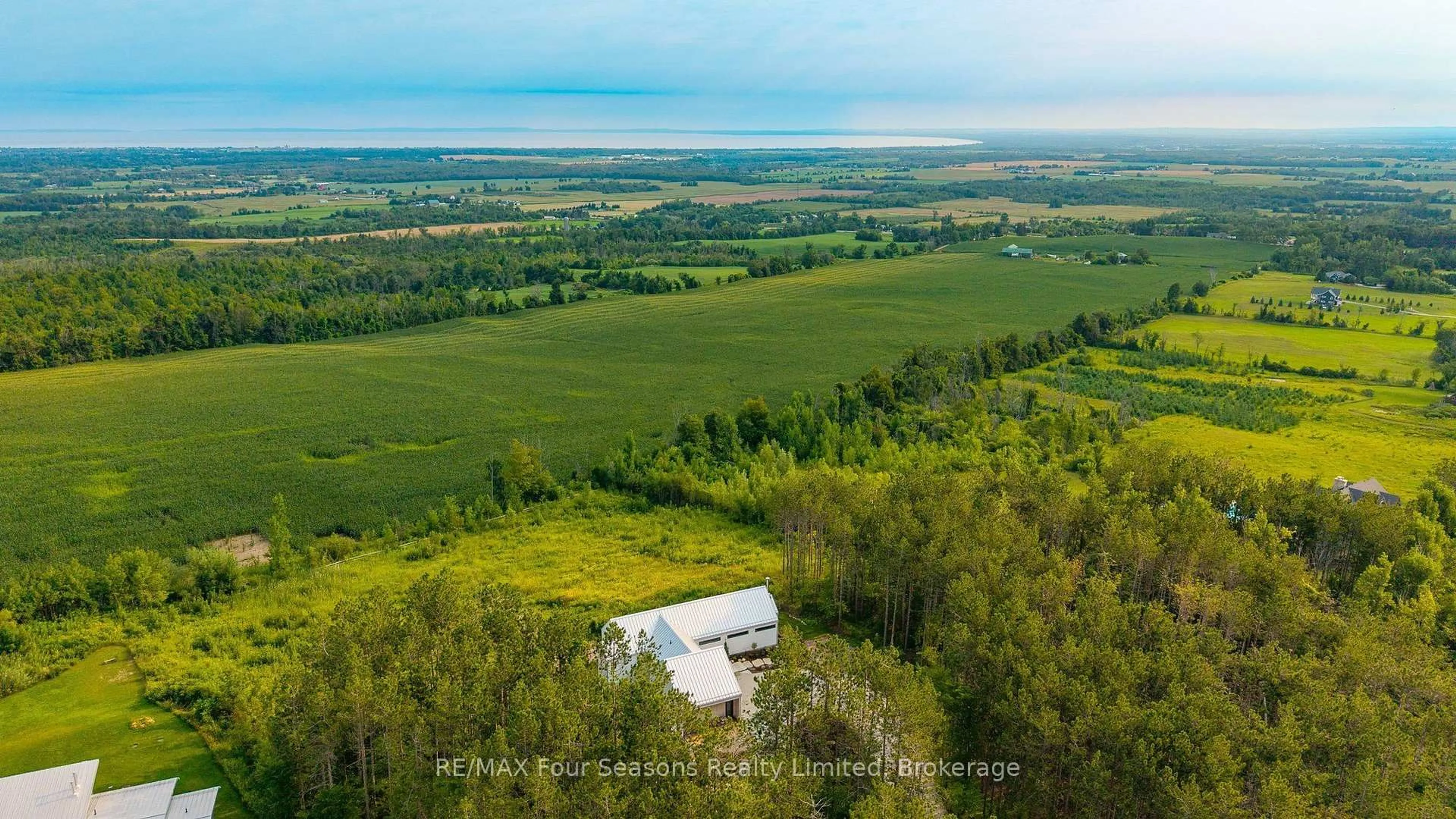 A pic from outside/outdoor area/front of a property/back of a property/a pic from drone, water/lake/river/ocean view for 58 Sydenham Tr, Clearview Ontario L0M 1H0