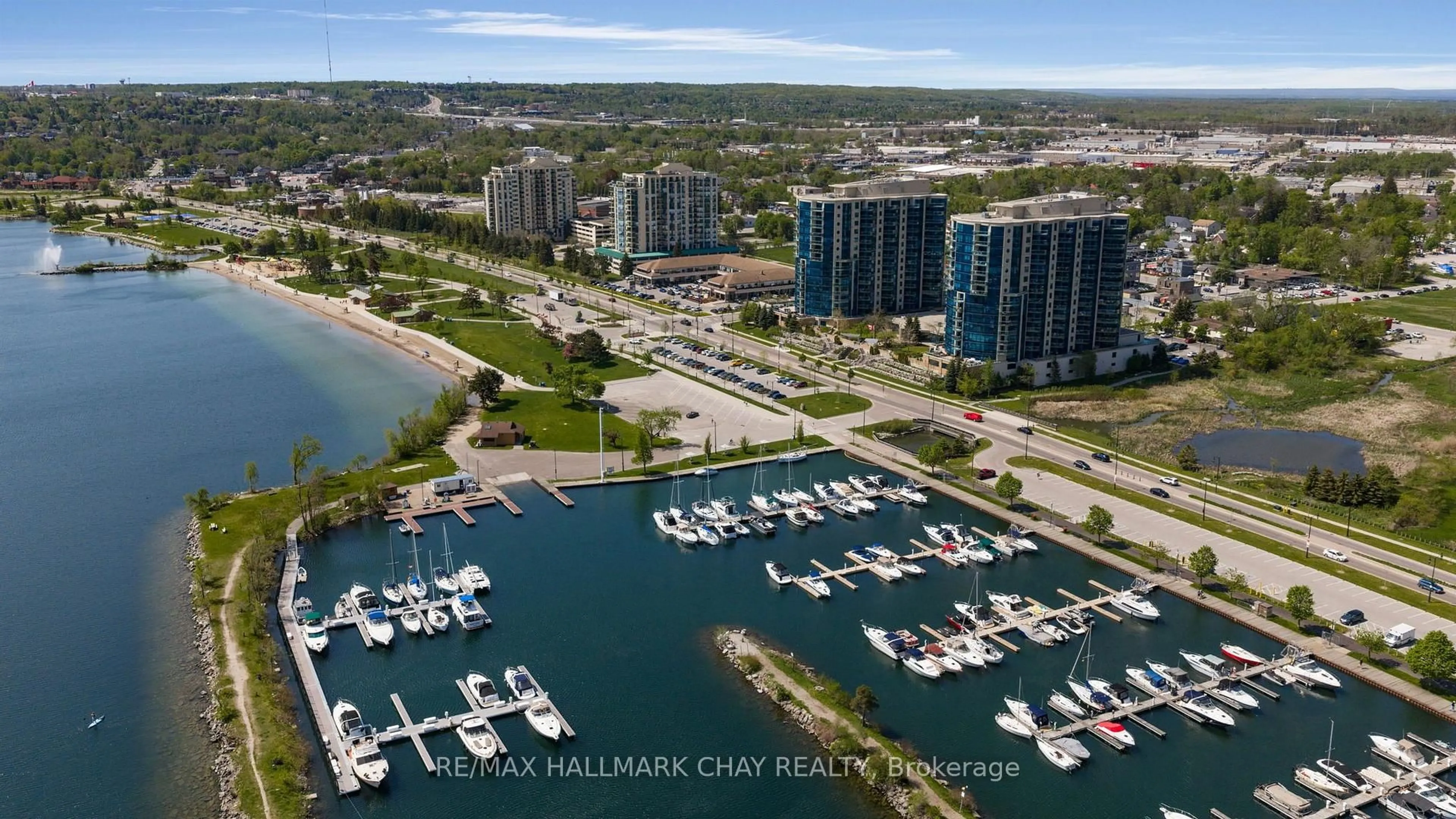 A pic from outside/outdoor area/front of a property/back of a property/a pic from drone, water/lake/river/ocean view for 37 Ellen St #702, Barrie Ontario L4N 6G2