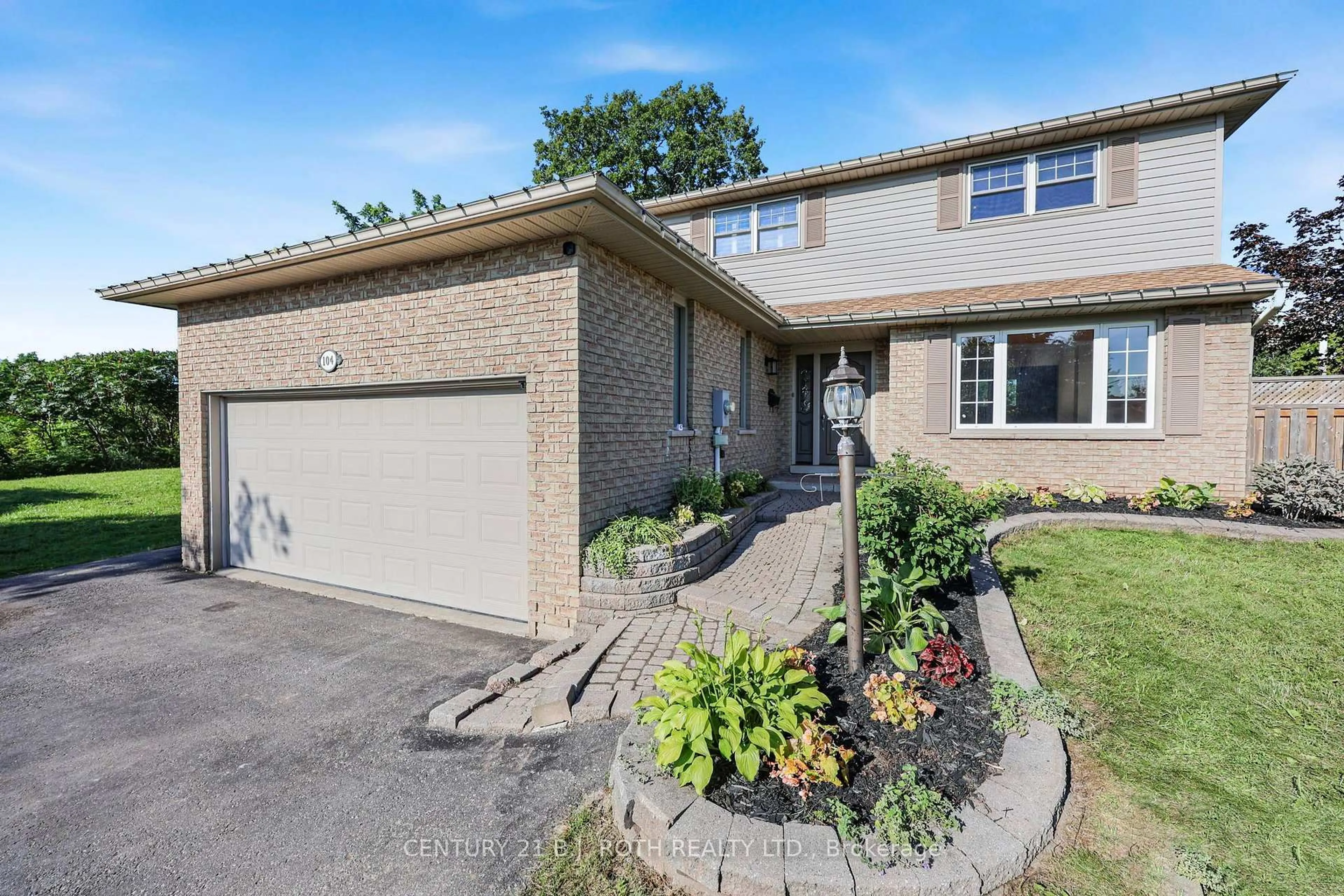 Home with brick exterior material, street for 104 WOODSIDE Dr, Orillia Ontario L3V 7N7