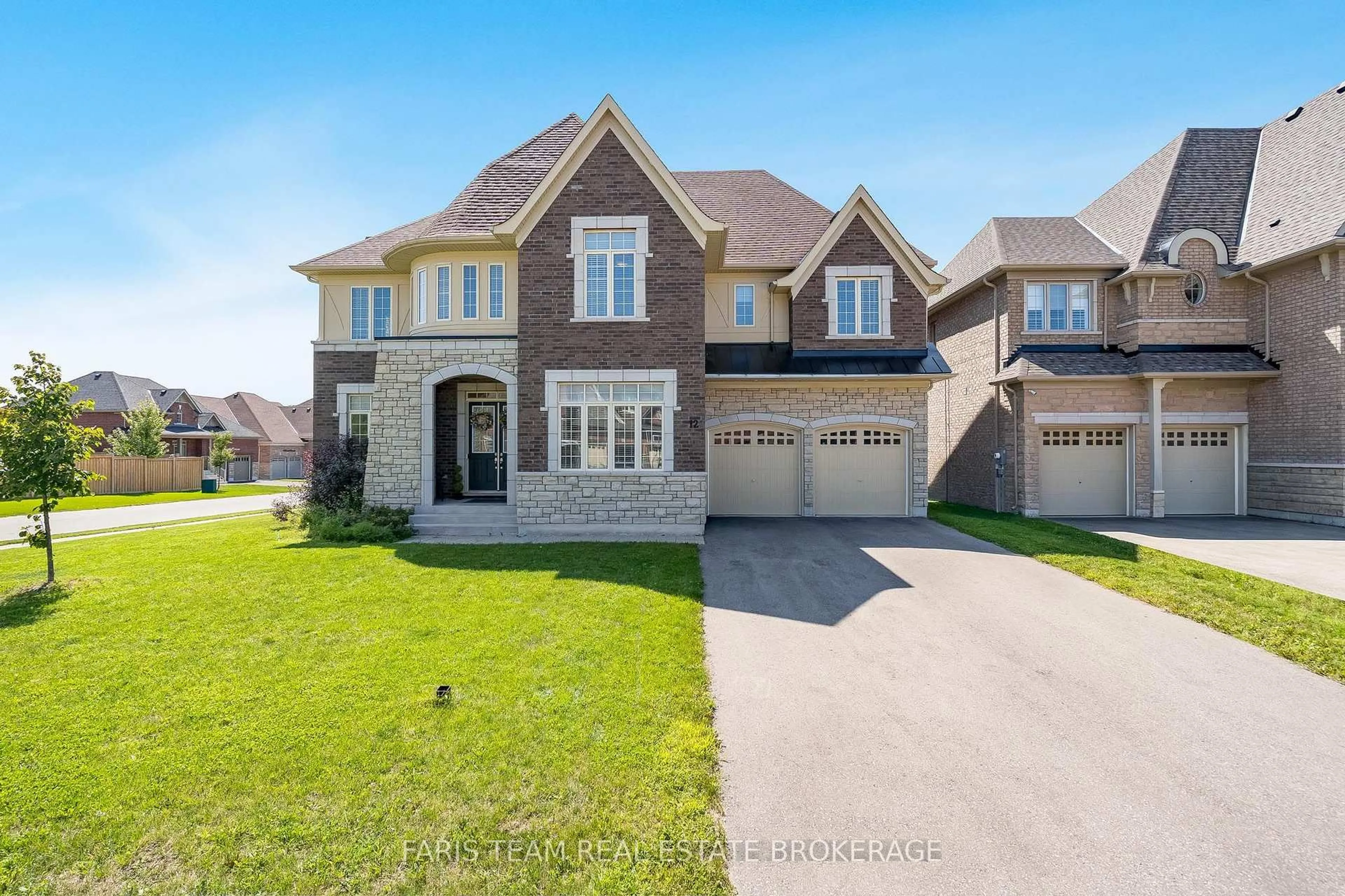Home with brick exterior material, street for 12 Thompson Way, Springwater Ontario L9X 2A5