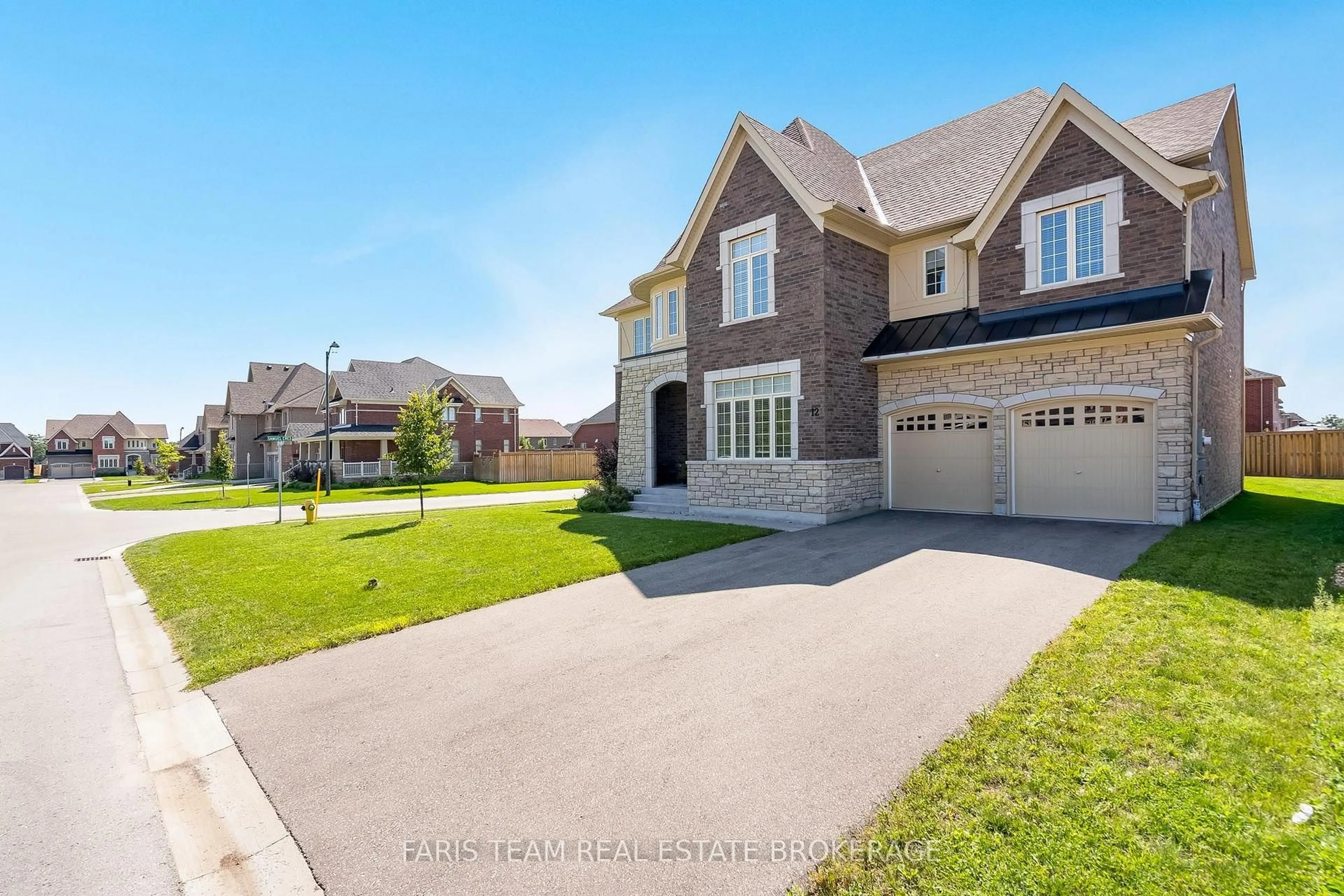 Home with brick exterior material, street for 12 Thompson Way, Springwater Ontario L9X 2A5