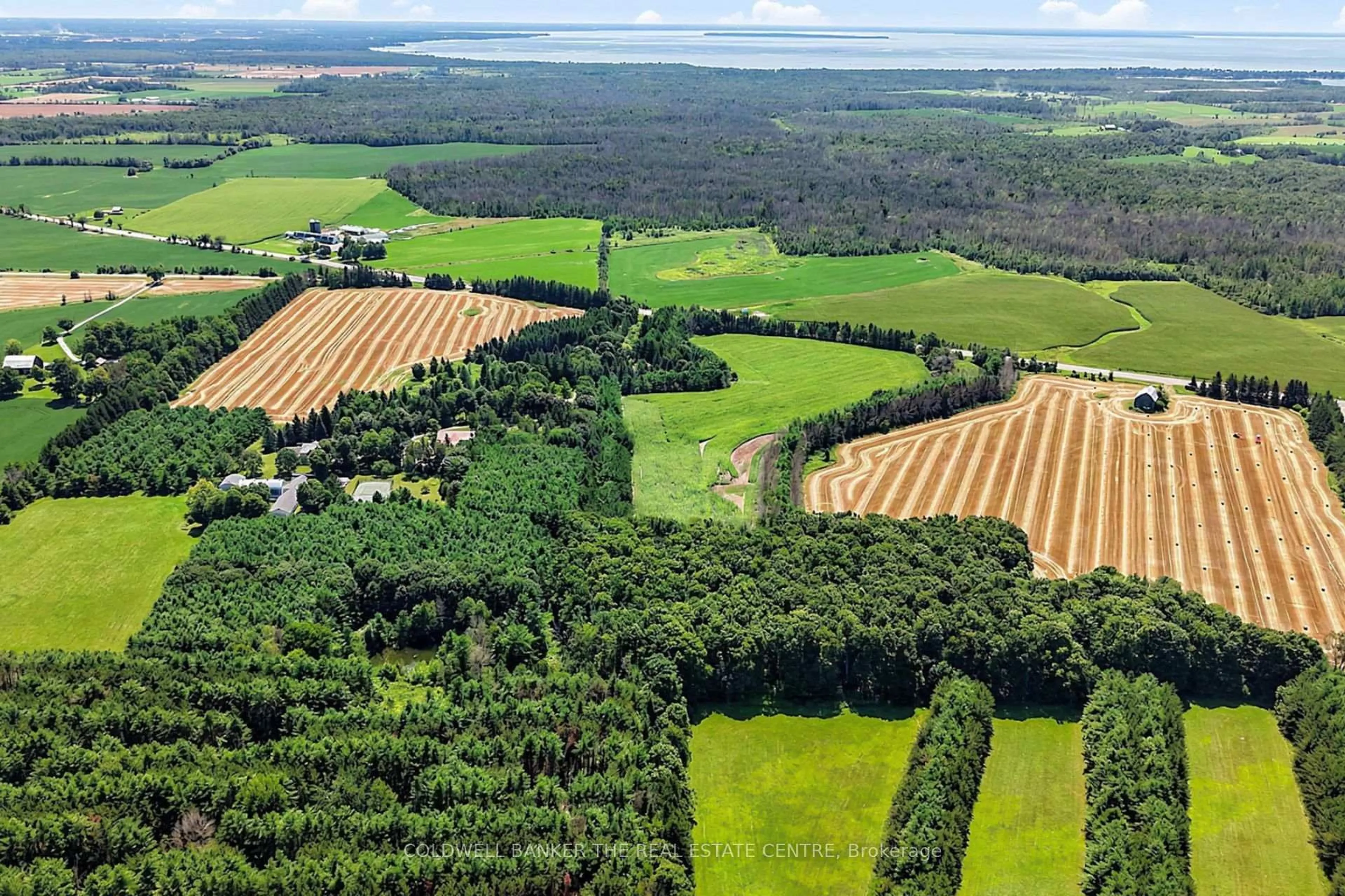 A pic from outside/outdoor area/front of a property/back of a property/a pic from drone, forest/trees view for 4361 12 Highway #*Parcel Package*, Ramara Ontario L3V 6J6