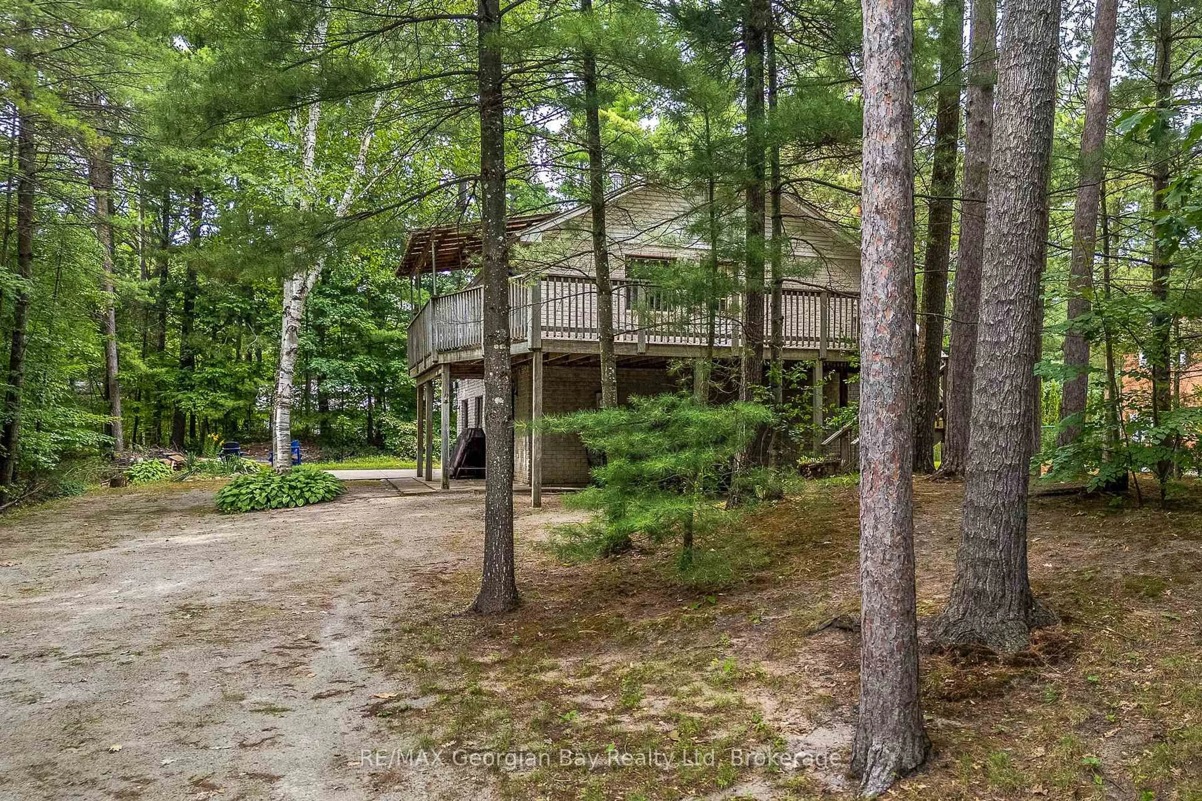 A pic from outside/outdoor area/front of a property/back of a property/a pic from drone, forest/trees view for 754 Lafontaine Rd, Tiny Ontario L9M 0L5