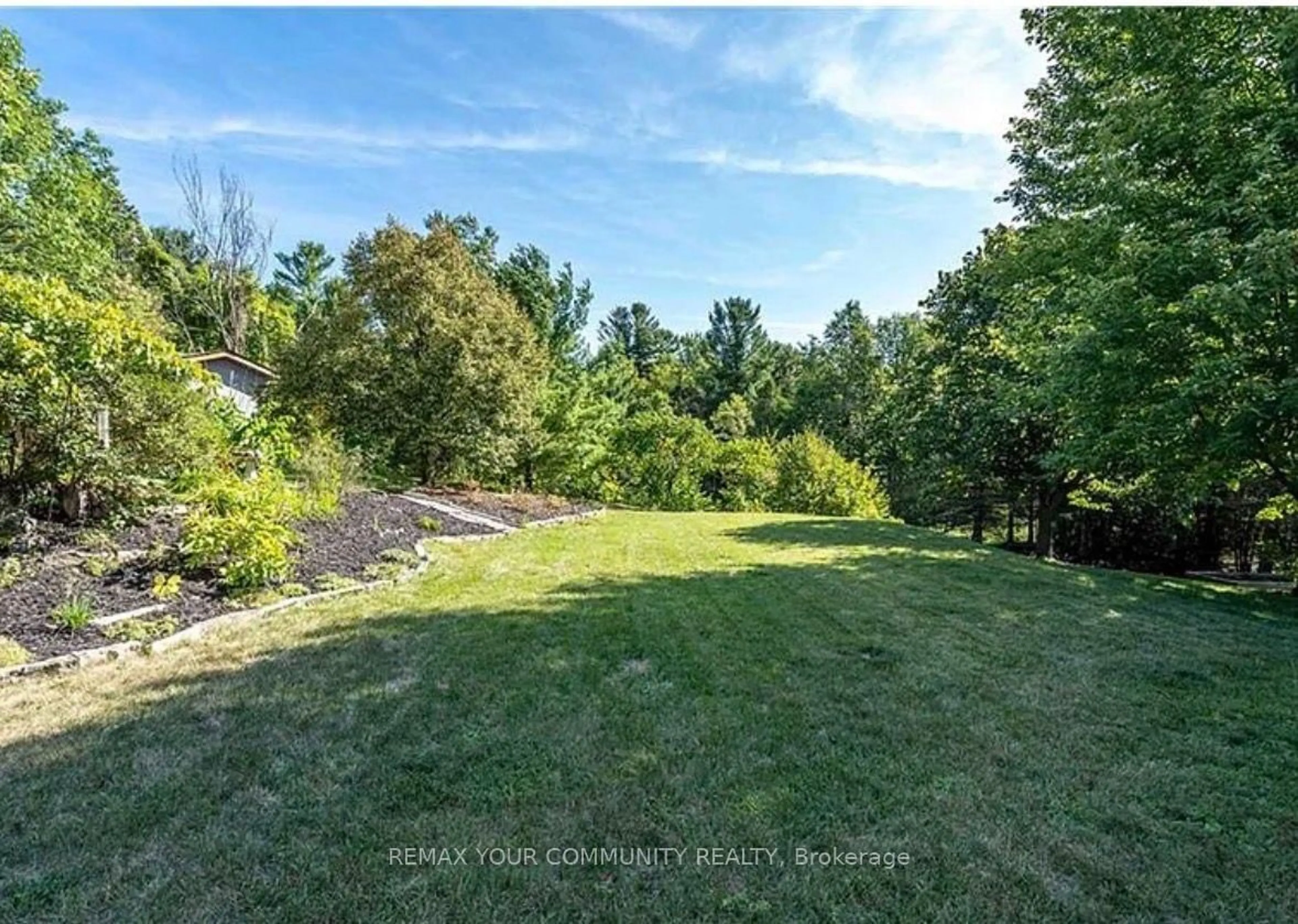A pic from outside/outdoor area/front of a property/back of a property/a pic from drone, water/lake/river/ocean view for 12 Cairns Blvd, Springwater Ontario L0L 1X0