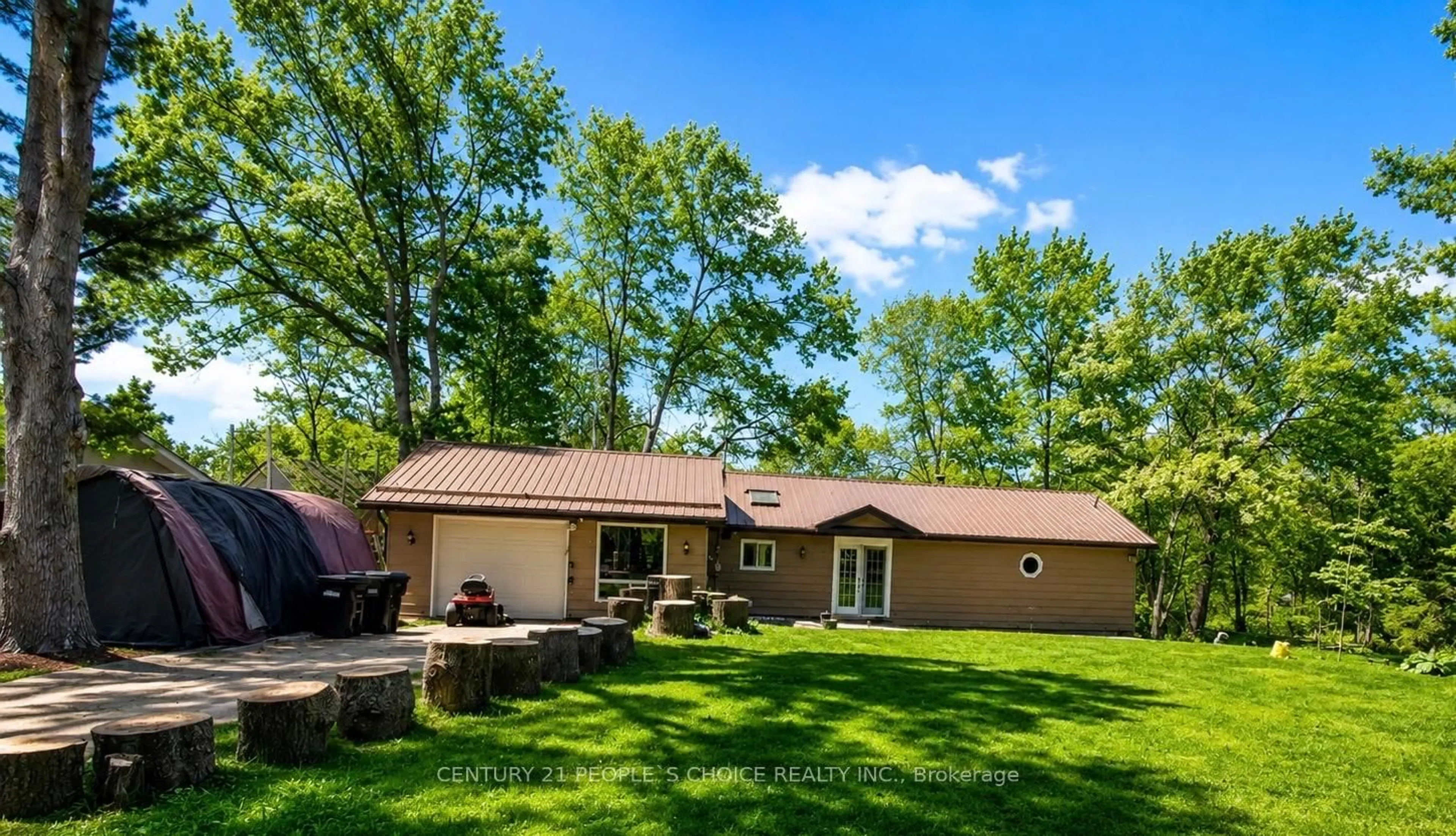 A pic from outside/outdoor area/front of a property/back of a property/a pic from drone, forest/trees view for 7696 South River Rd, Ramara Ontario L0K 2B0