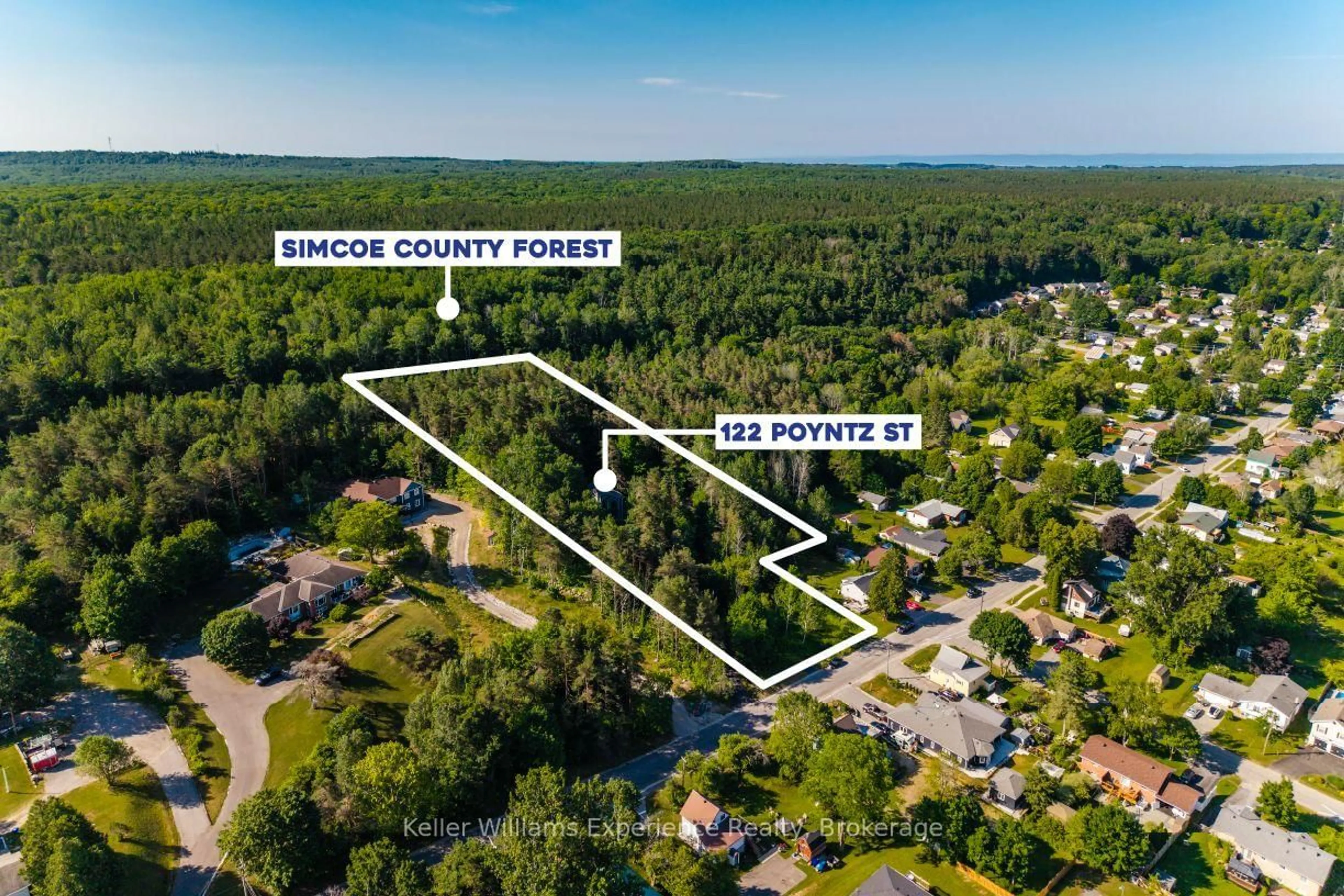 A pic from outside/outdoor area/front of a property/back of a property/a pic from drone, forest/trees view for 122 Poyntz St, Penetanguishene Ontario L9M 1P4