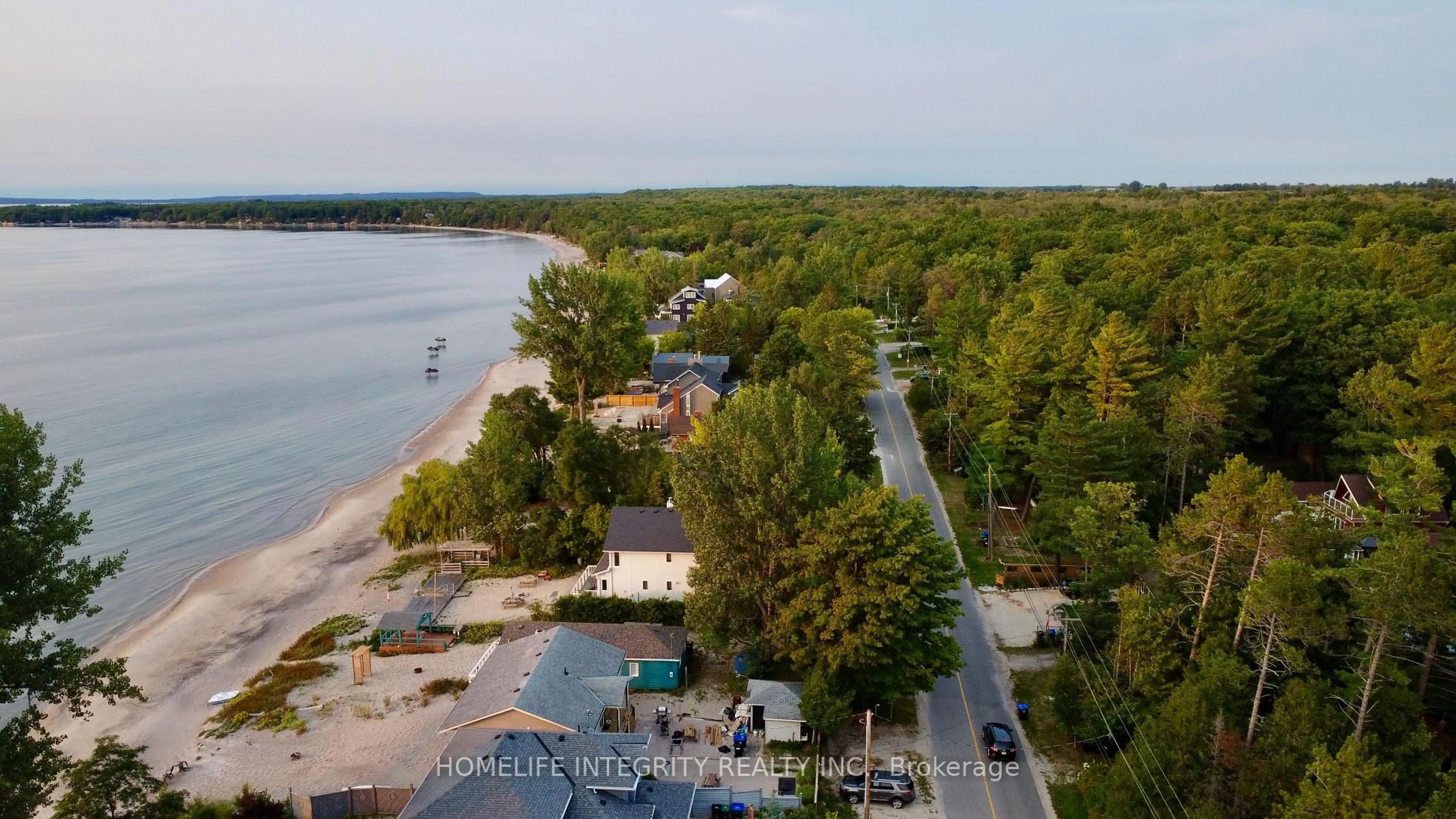 A pic from outside/outdoor area/front of a property/back of a property/a pic from drone, water/lake/river/ocean view for 2197 Tiny Beaches Rd, Tiny Ontario L0L 1P1