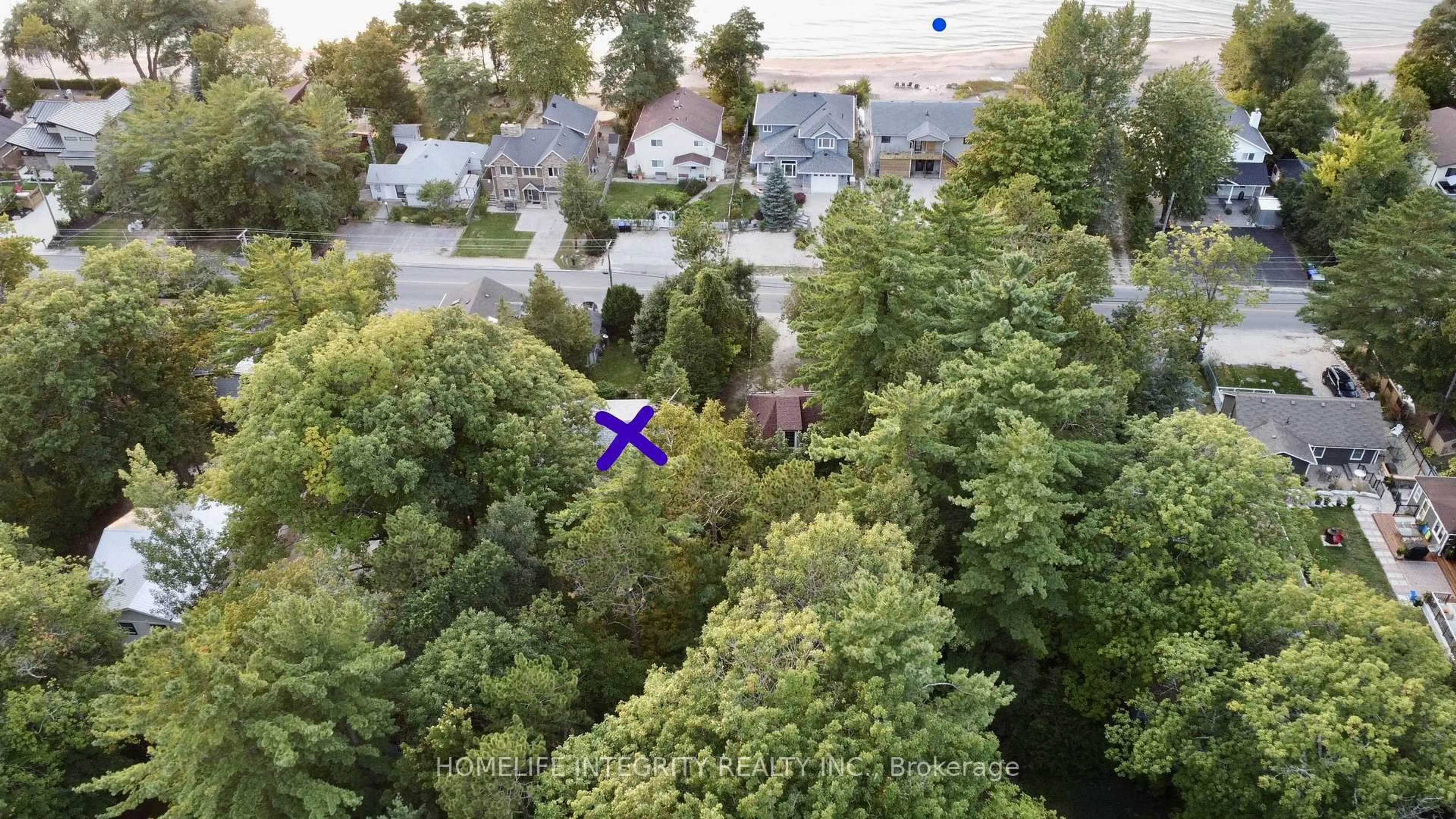 A pic from outside/outdoor area/front of a property/back of a property/a pic from drone, forest/trees view for 2197 Tiny Beaches Rd, Tiny Ontario L0L 1P1