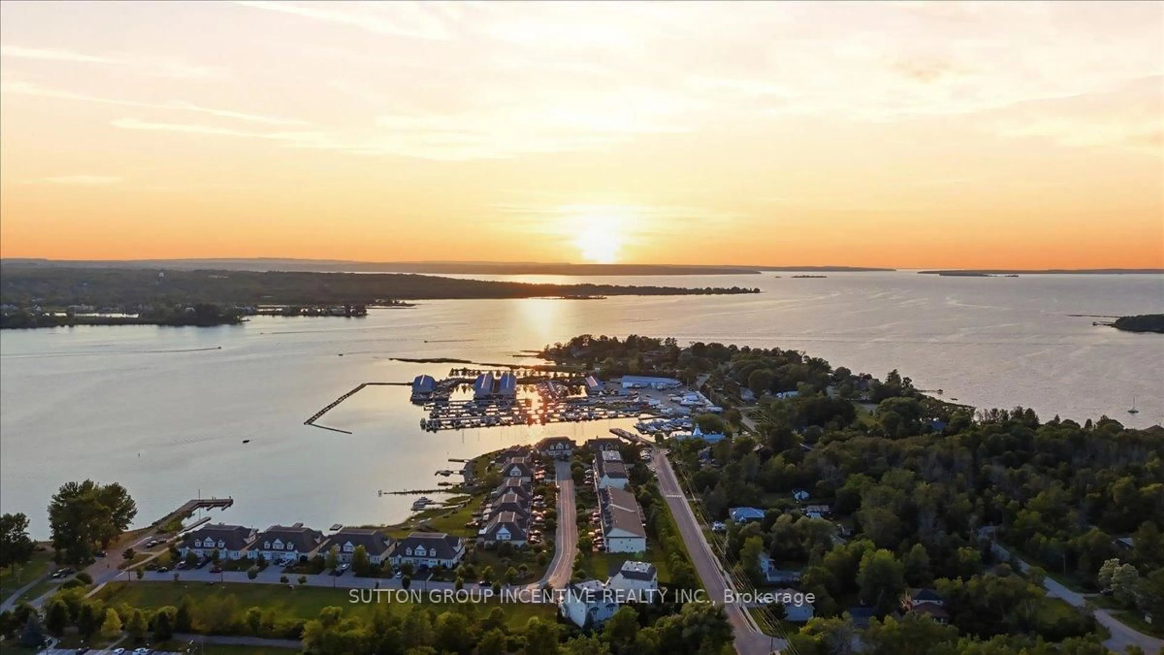 A pic from outside/outdoor area/front of a property/back of a property/a pic from drone, water/lake/river/ocean view for 107 Park St, Tay Ontario L0K 2A0