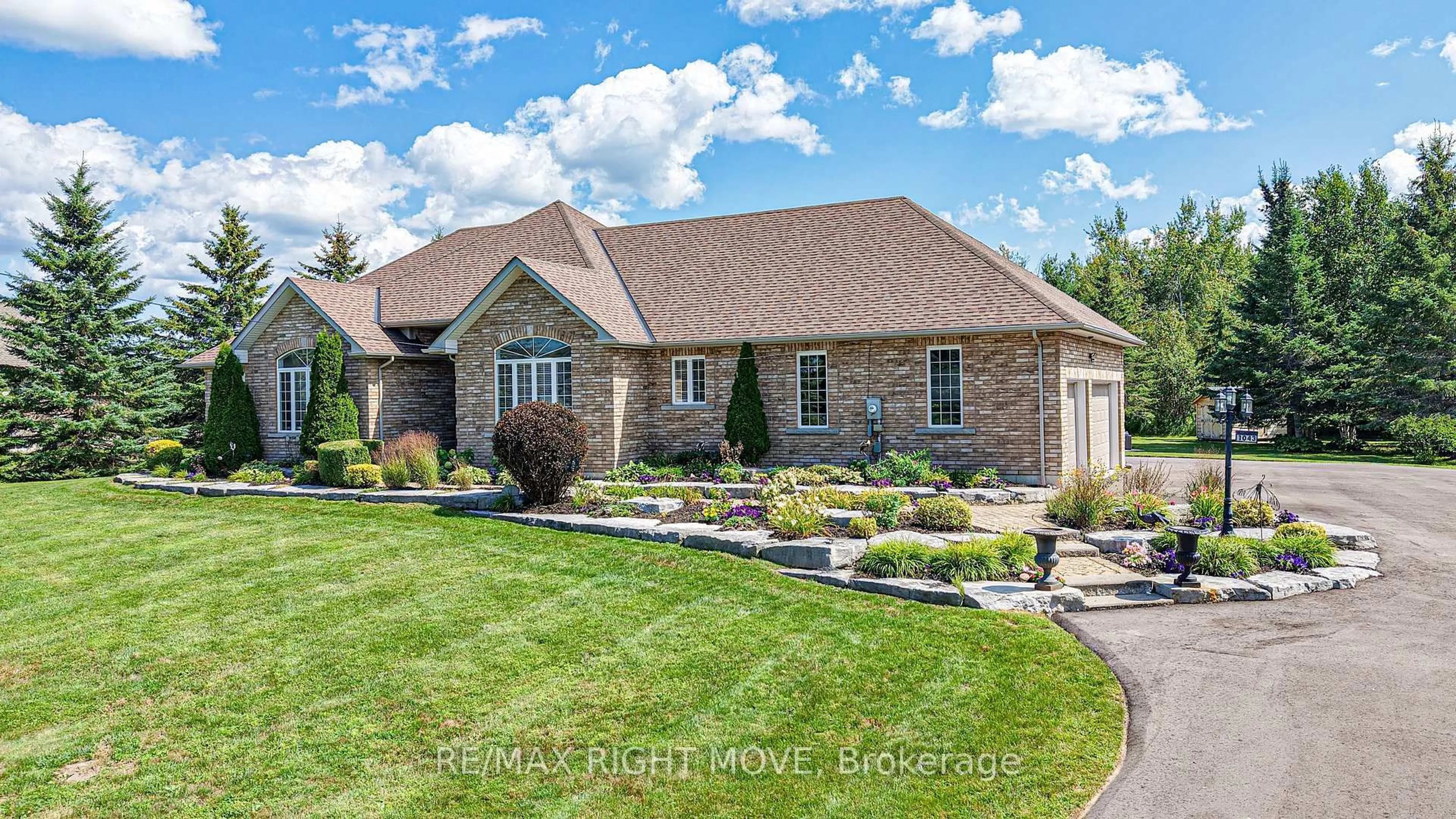 Home with brick exterior material, street for 1043 Hurlwood Lane, Severn Ontario L3V 6H4