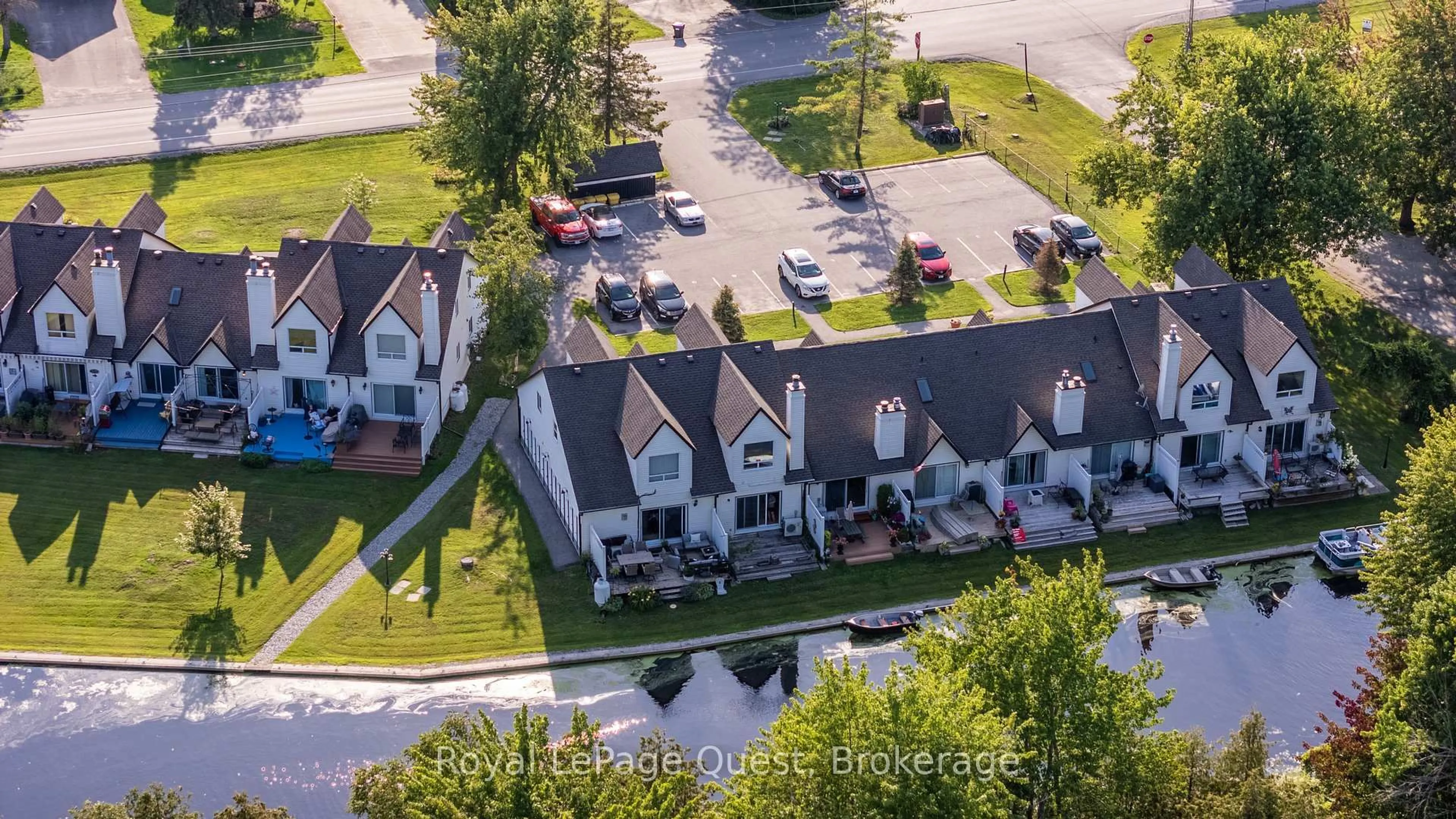 A pic from outside/outdoor area/front of a property/back of a property/a pic from drone, street for 81 Laguna Pkwy #7, Ramara Ontario L0K 1B0