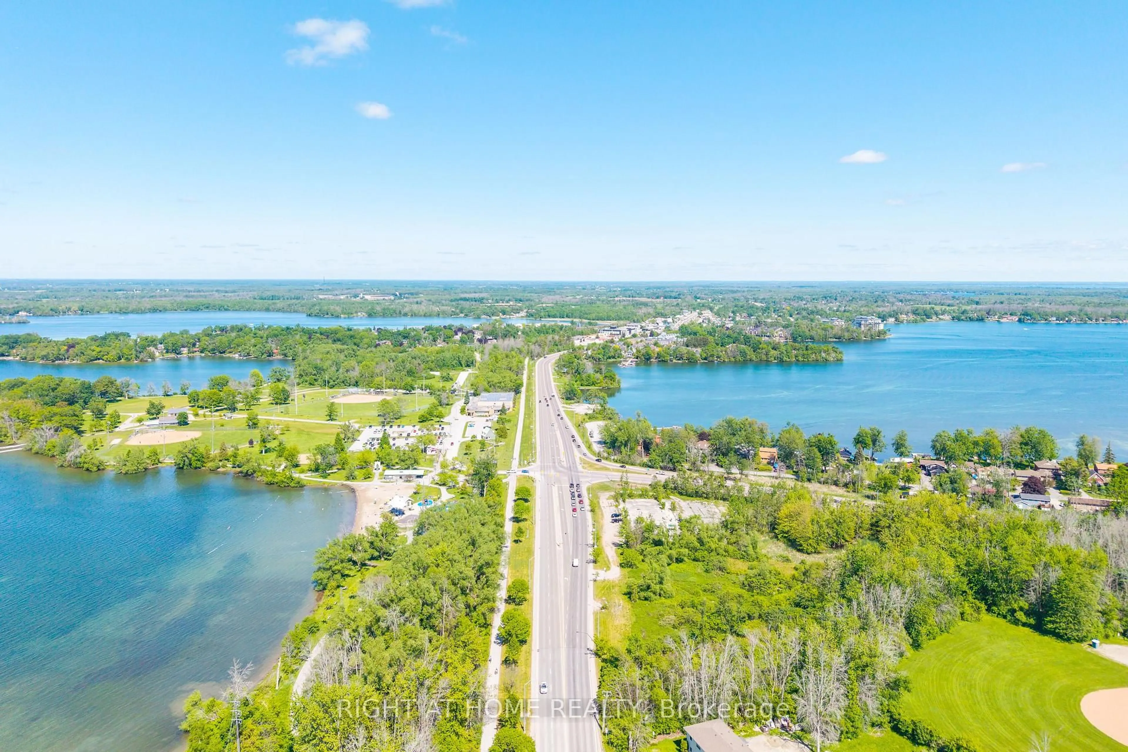 A pic from outside/outdoor area/front of a property/back of a property/a pic from drone, water/lake/river/ocean view for 4654 Mcneil St, Ramara Ontario L3V 0M9