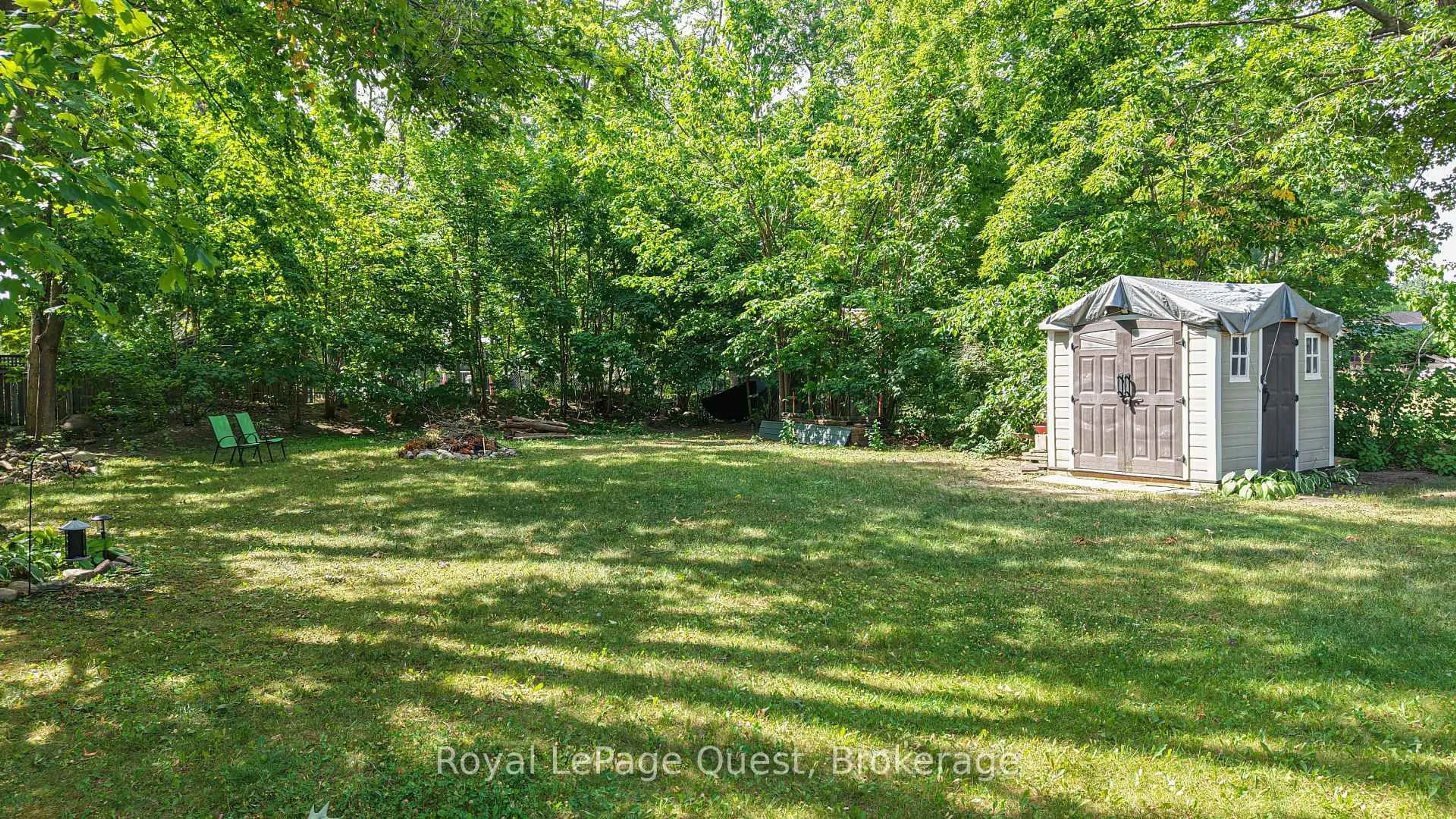 A pic from outside/outdoor area/front of a property/back of a property/a pic from drone, forest/trees view for 401 Mississaga St, Orillia Ontario L3V 3C4