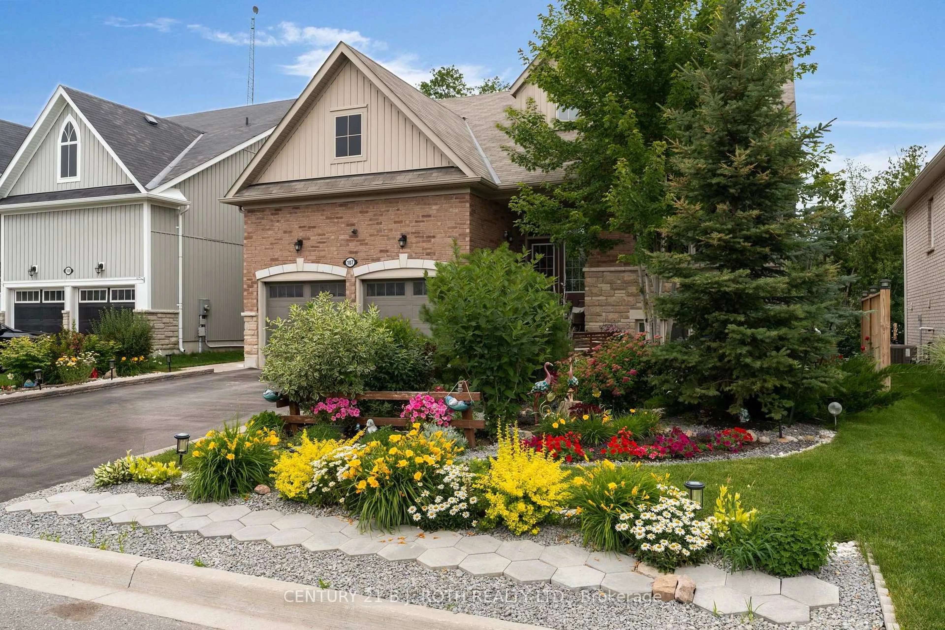 Home with brick exterior material, street for 107 Allegra Dr, Wasaga Beach Ontario L9Z 0H5