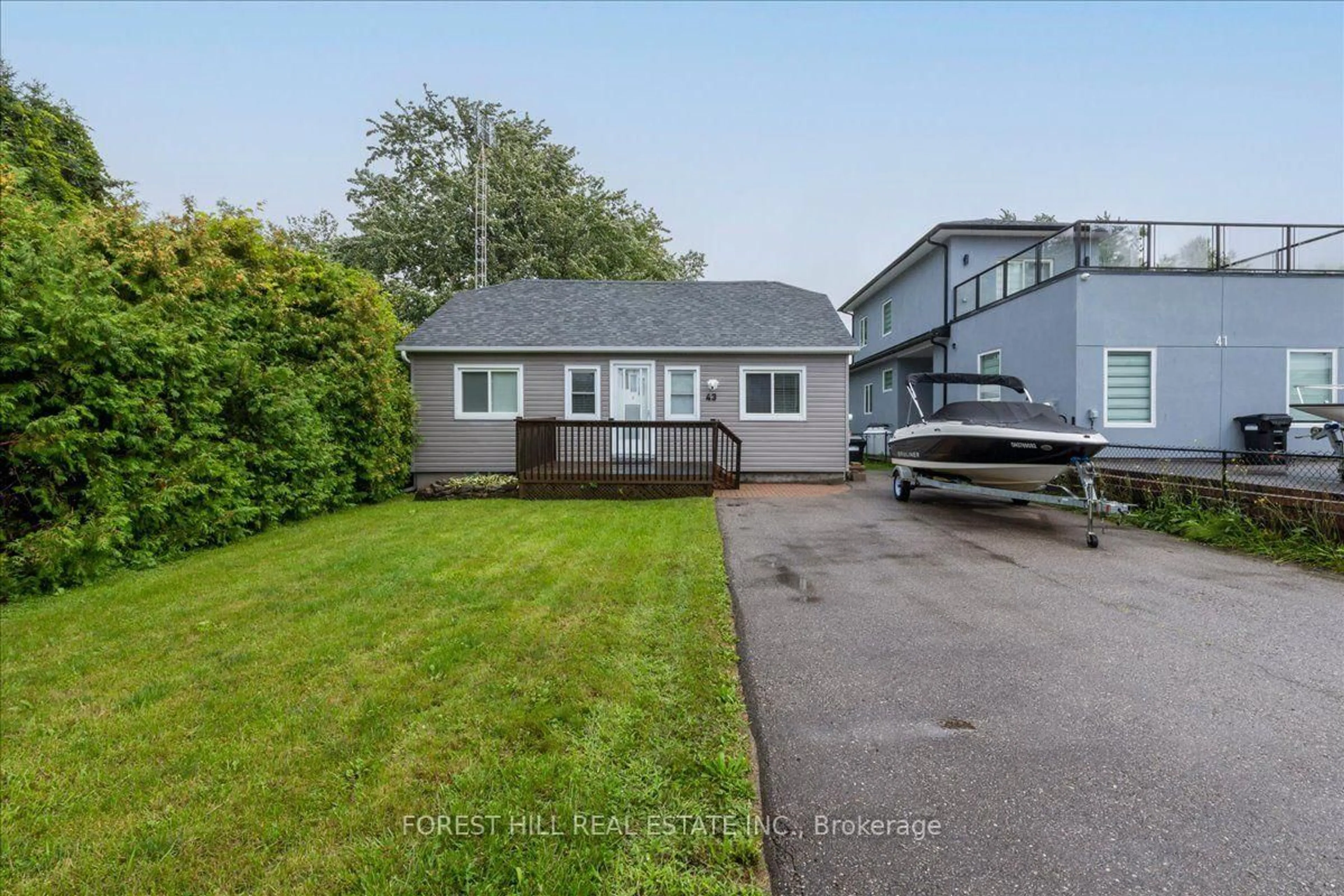 A pic from outside/outdoor area/front of a property/back of a property/a pic from drone, street for 43 Lake Ave, Ramara Ontario L0K 1B0
