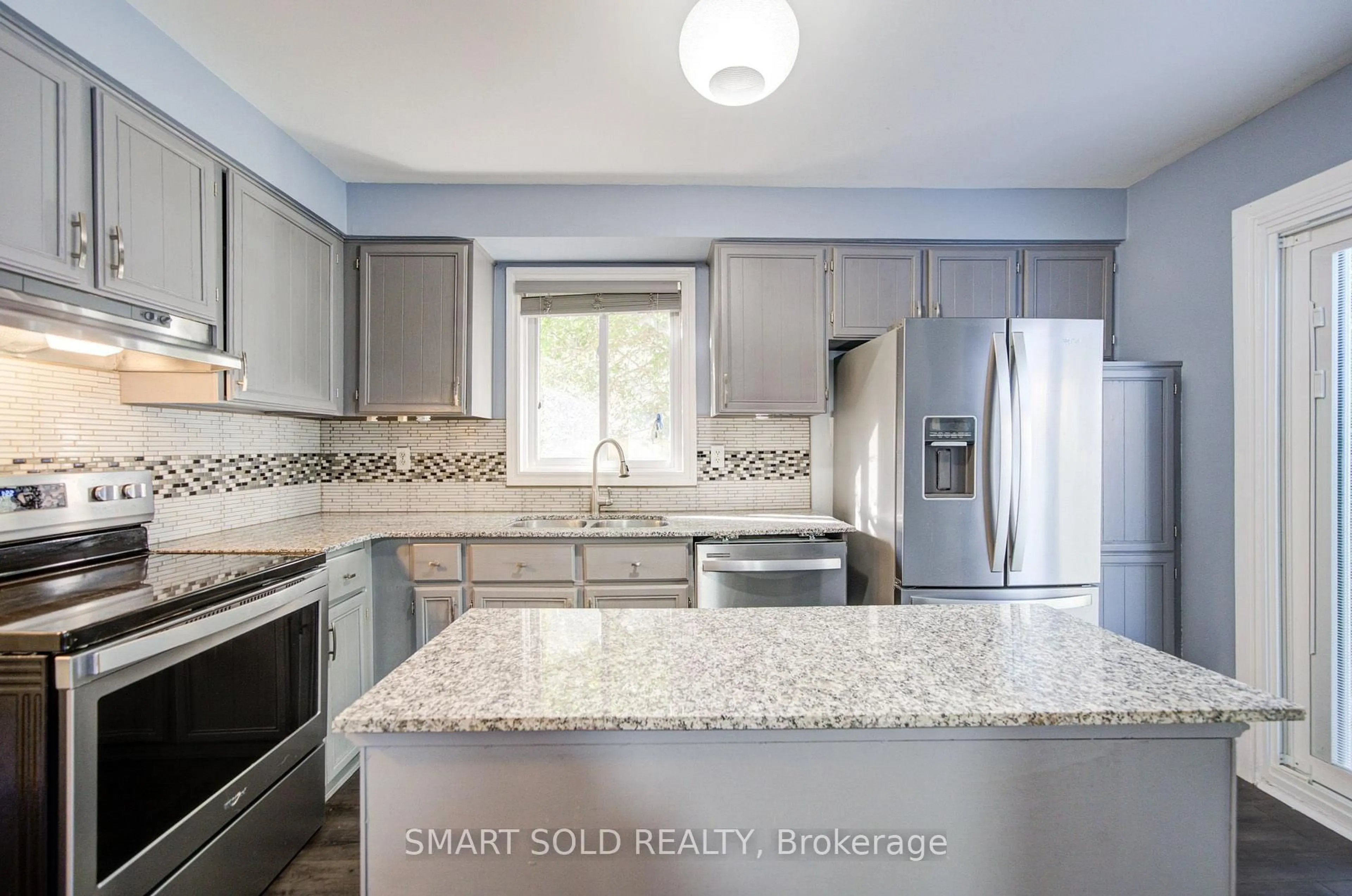 Open concept kitchen, ceramic/tile floor for 90 Moon Dr, Barrie Ontario L4N 7G9