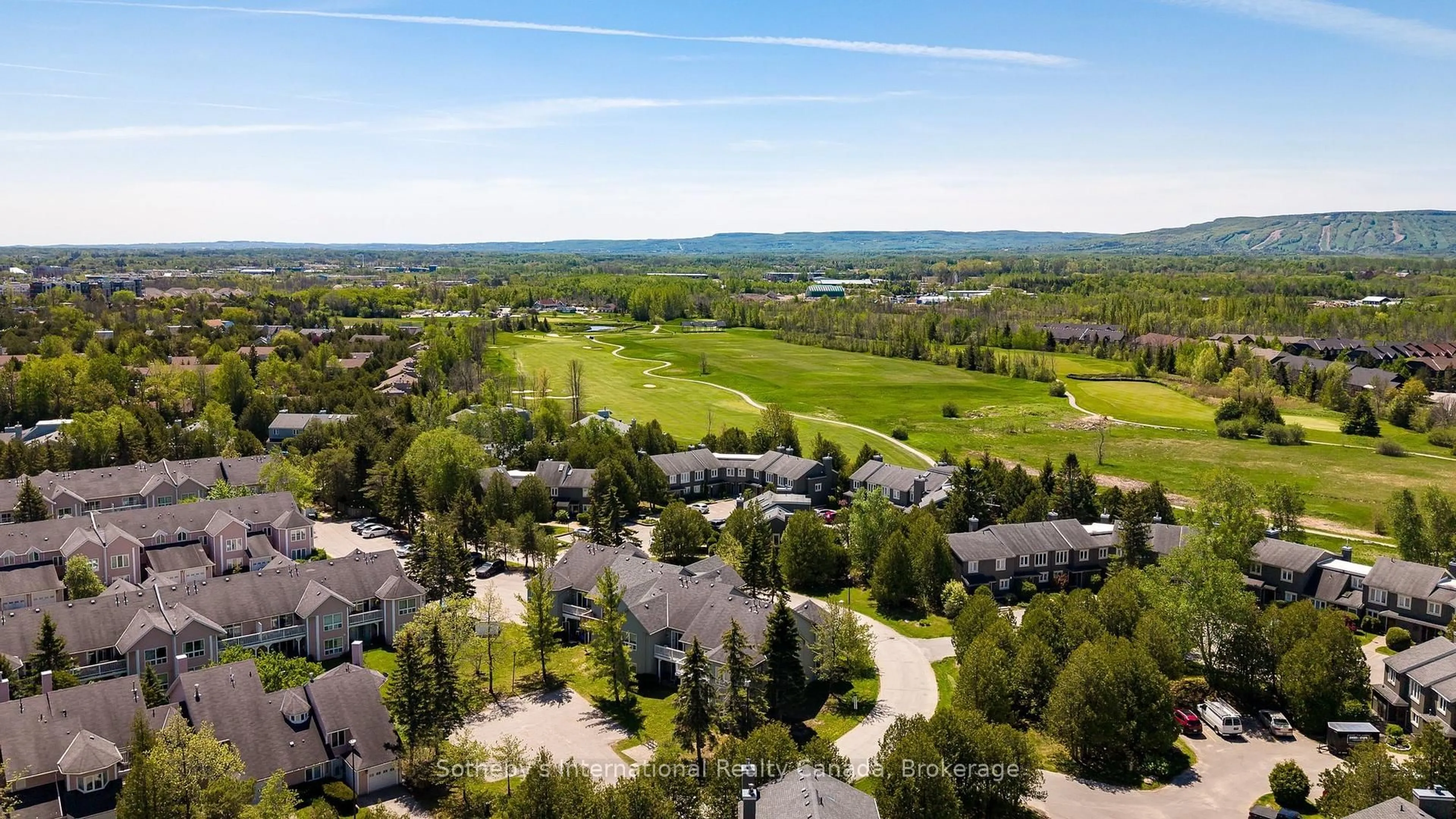 A pic from outside/outdoor area/front of a property/back of a property/a pic from drone, water/lake/river/ocean view for 6 Brandy Lane #302, Collingwood Ontario L9Y 0X4