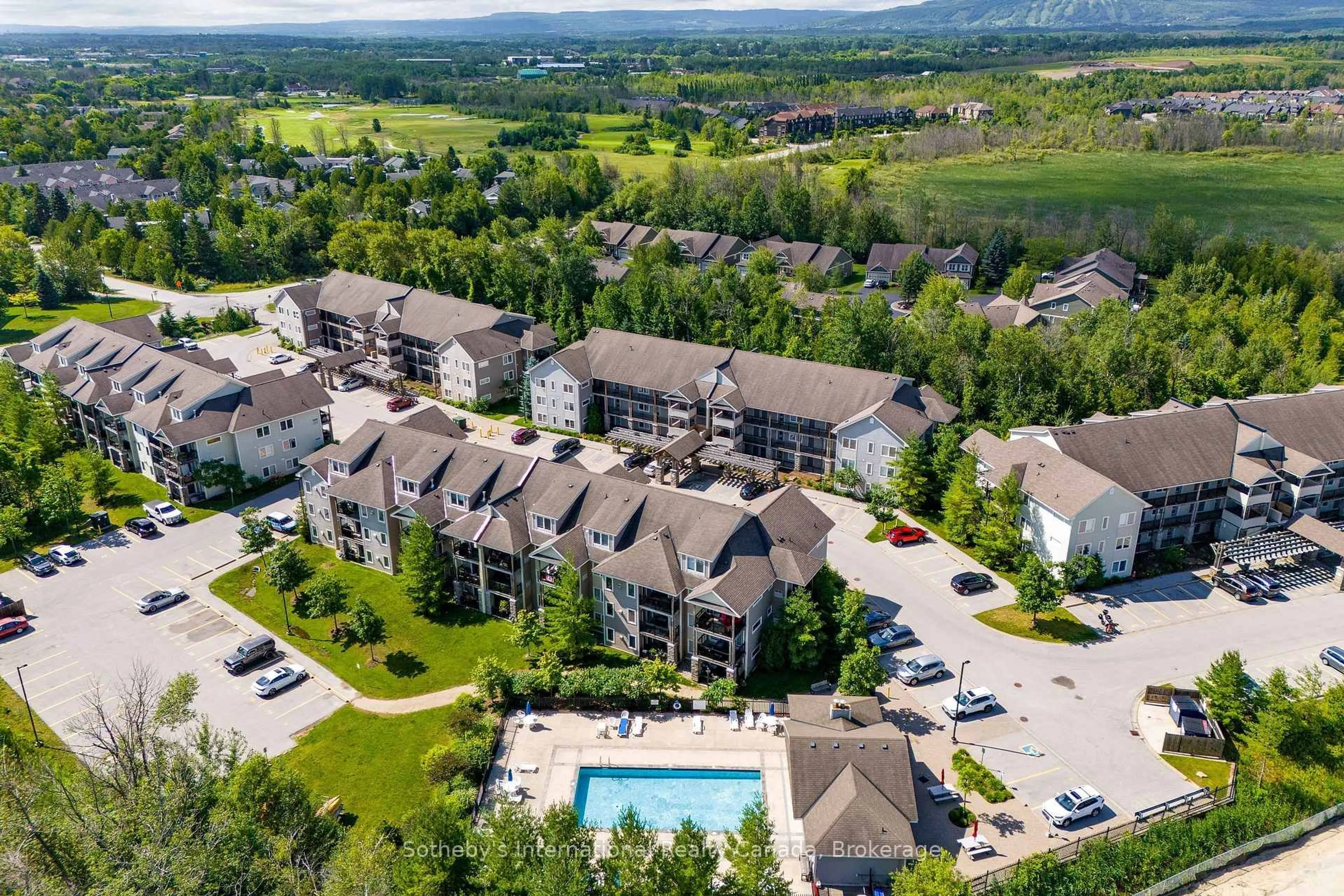 A pic from outside/outdoor area/front of a property/back of a property/a pic from drone, mountain view for 6 Brandy Lane #302, Collingwood Ontario L9Y 0X4
