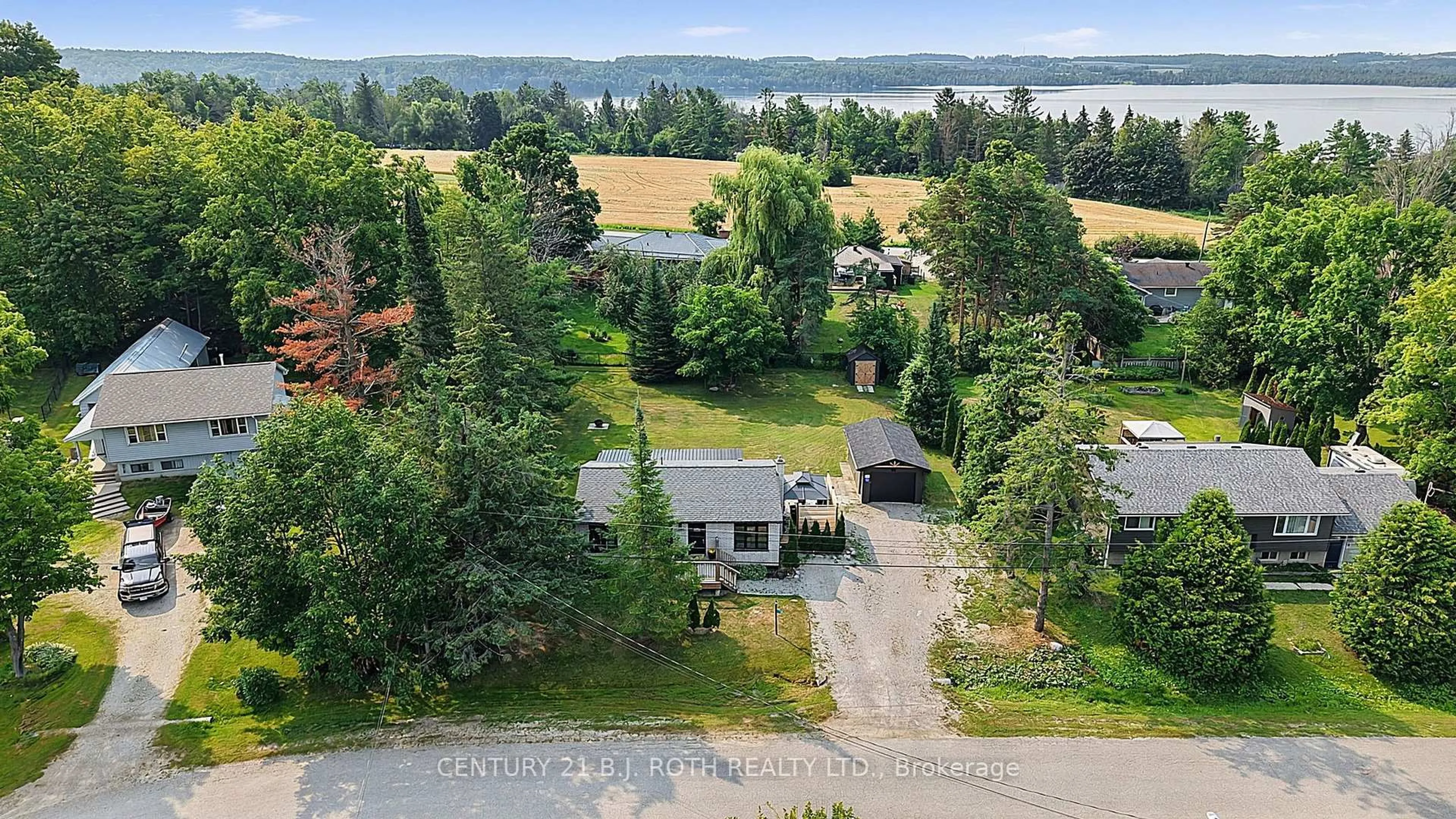 A pic from outside/outdoor area/front of a property/back of a property/a pic from drone, unknown for 25 Glengrove Ave, Oro-Medonte Ontario L3V 0J9