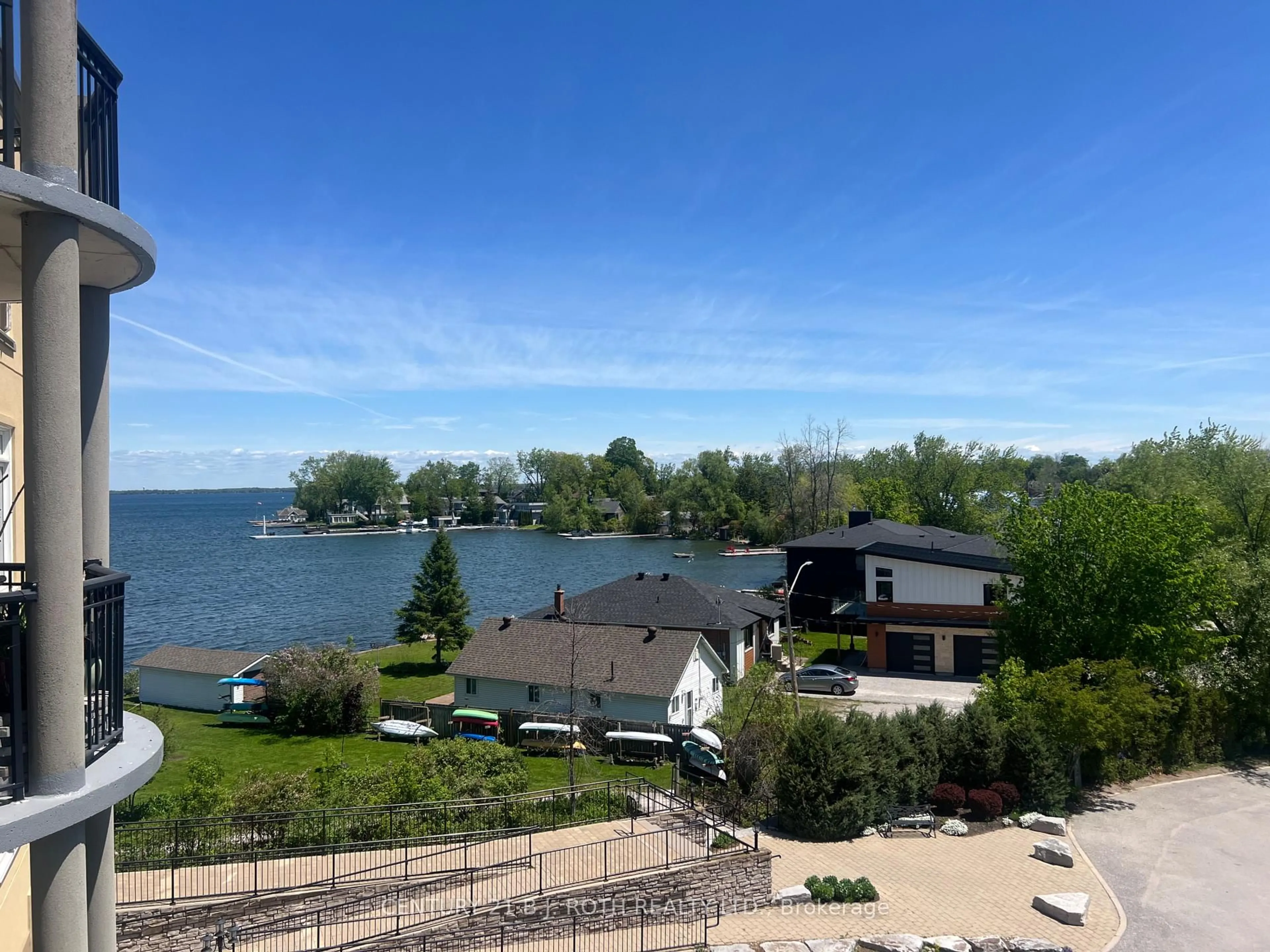 A pic from outside/outdoor area/front of a property/back of a property/a pic from drone, water/lake/river/ocean view for 140 Cedar Island Rd #311, Orillia Ontario L3V 1T1