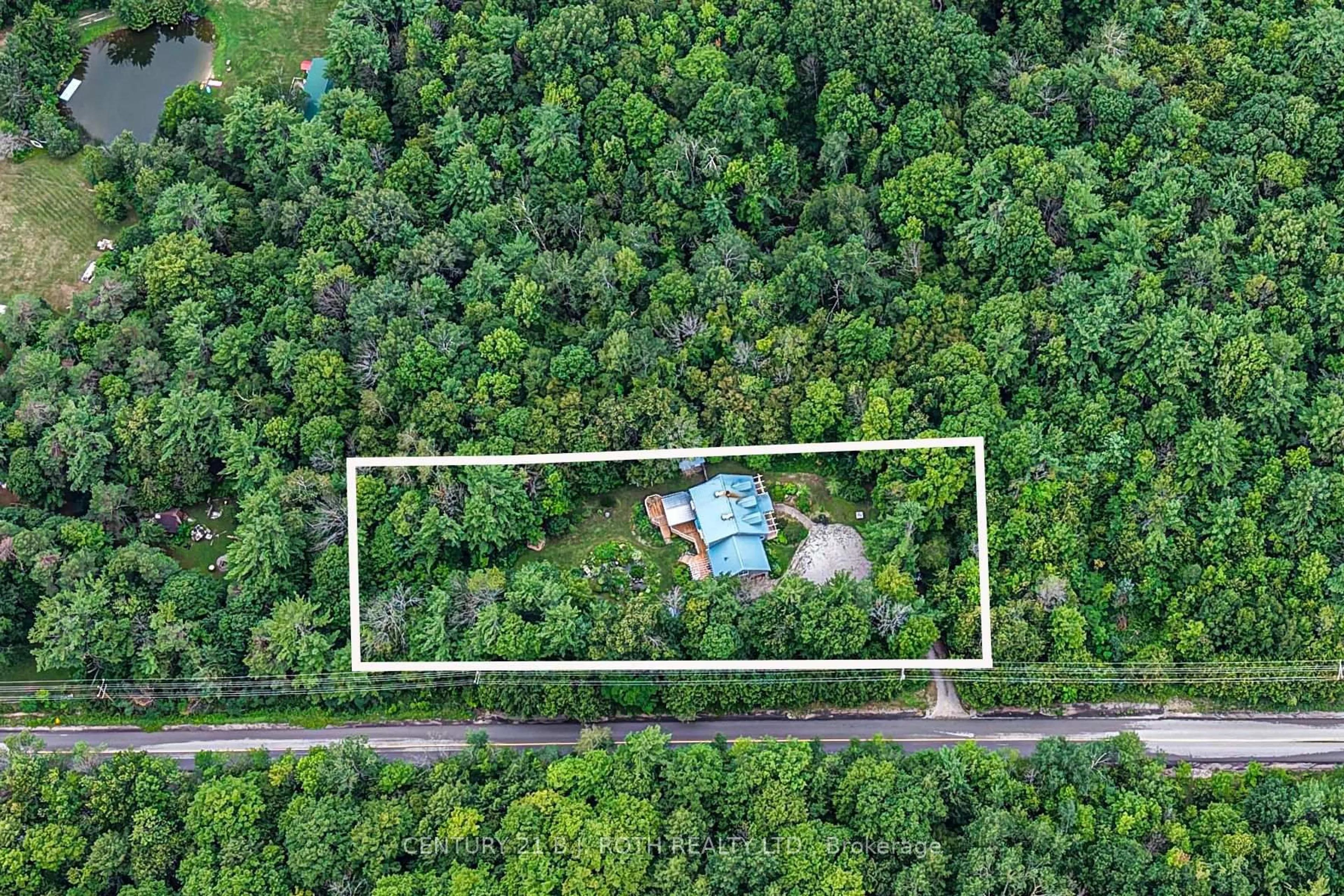 A pic from outside/outdoor area/front of a property/back of a property/a pic from drone, forest/trees view for 652 Warminster Sdrd, Oro-Medonte Ontario L0K 1E0