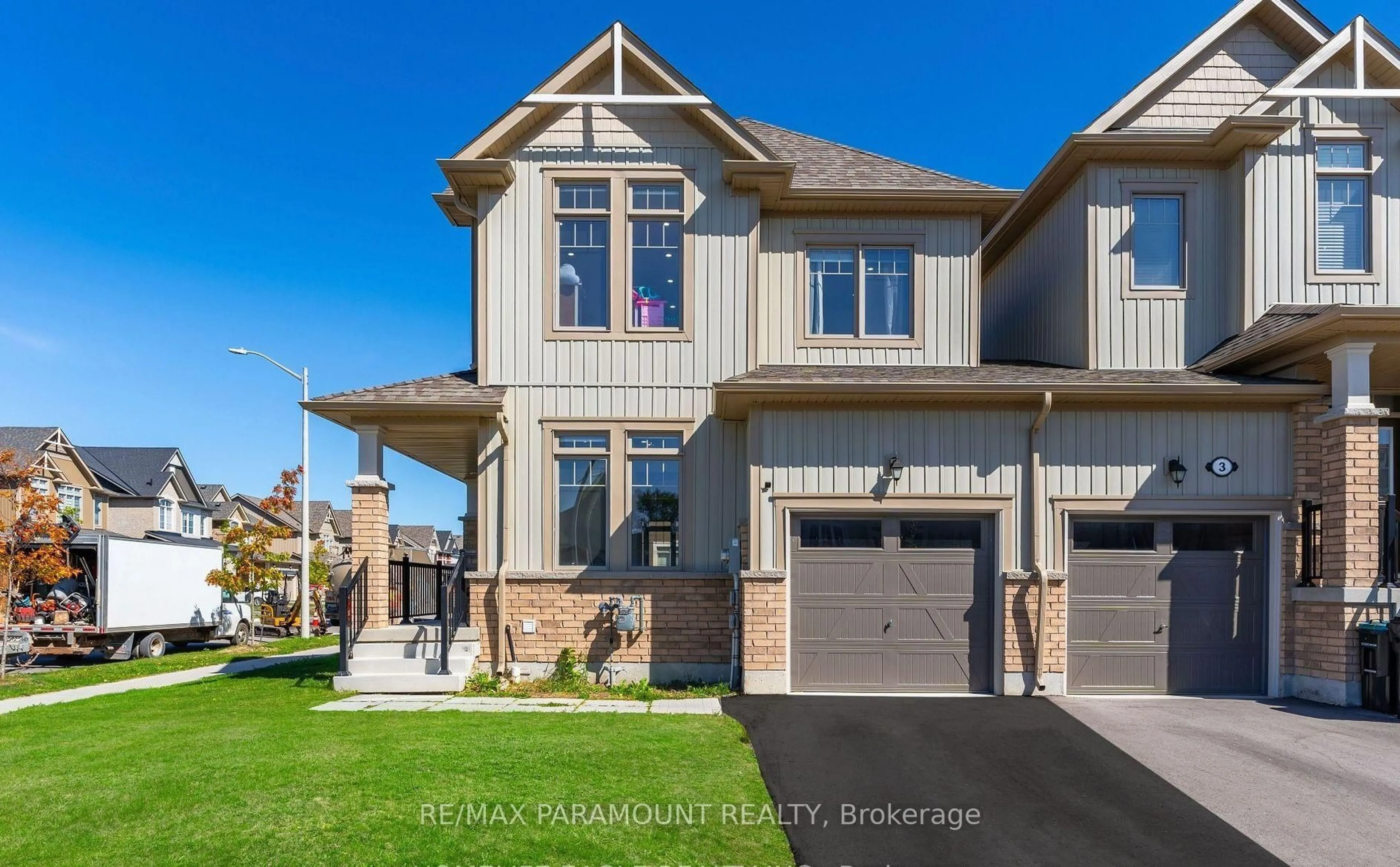 Home with brick exterior material, street for 58 Tracey Lane, Collingwood Ontario L9Y 3V2
