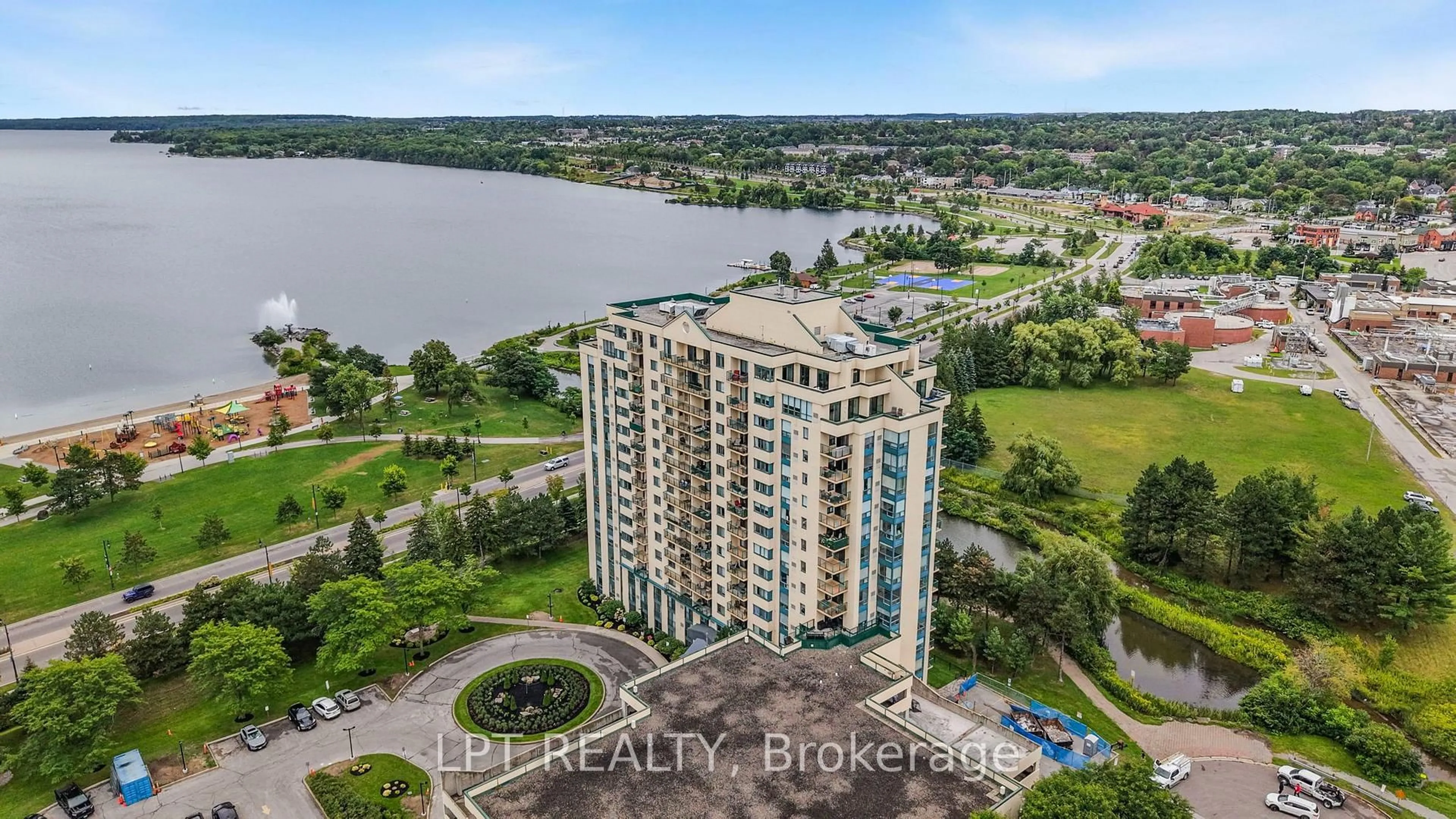 A pic from outside/outdoor area/front of a property/back of a property/a pic from drone, water/lake/river/ocean view for 75 Ellen St #1111, Barrie Ontario L4N 7R6