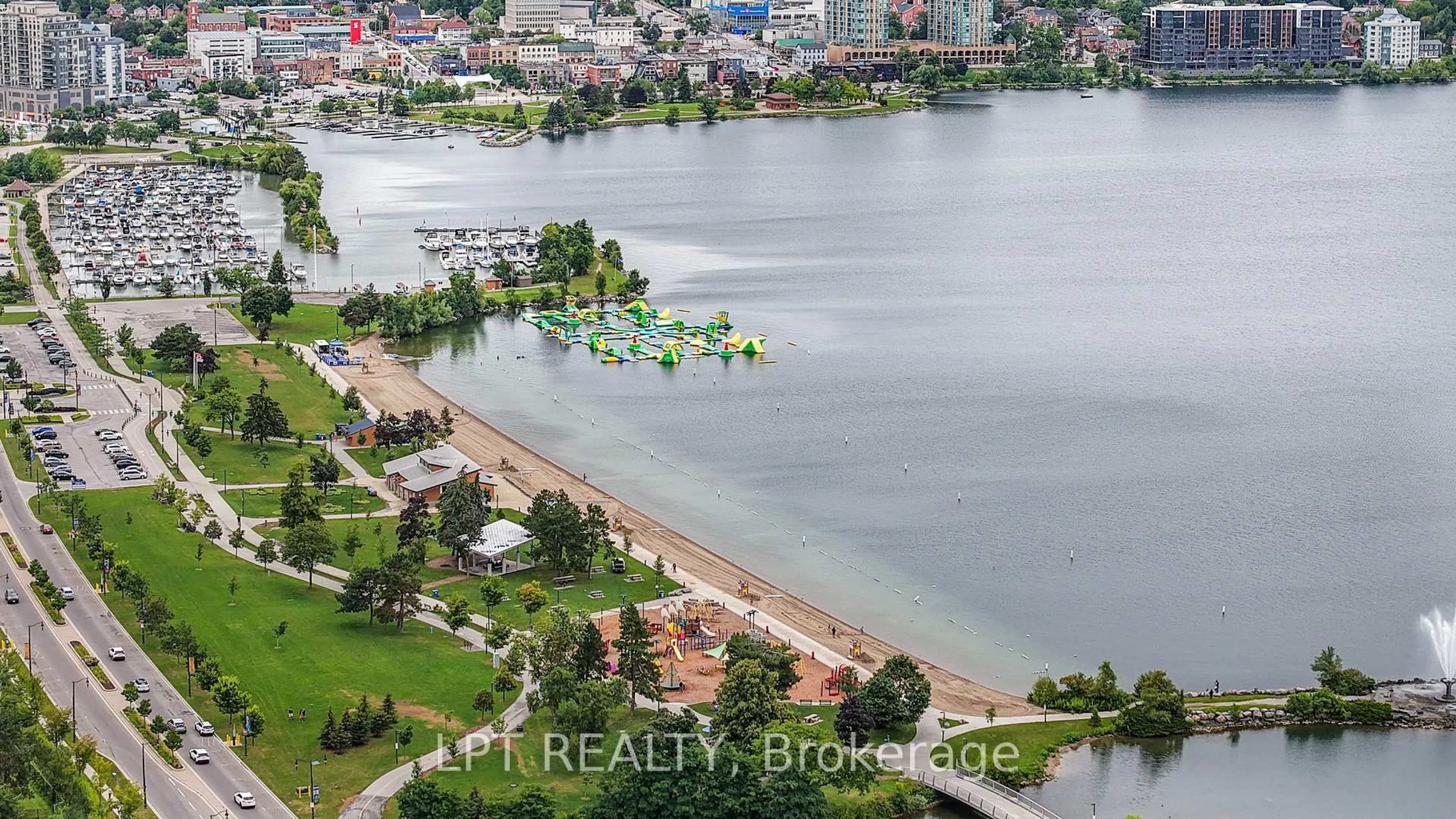 A pic from outside/outdoor area/front of a property/back of a property/a pic from drone, water/lake/river/ocean view for 75 Ellen St #1111, Barrie Ontario L4N 7R6