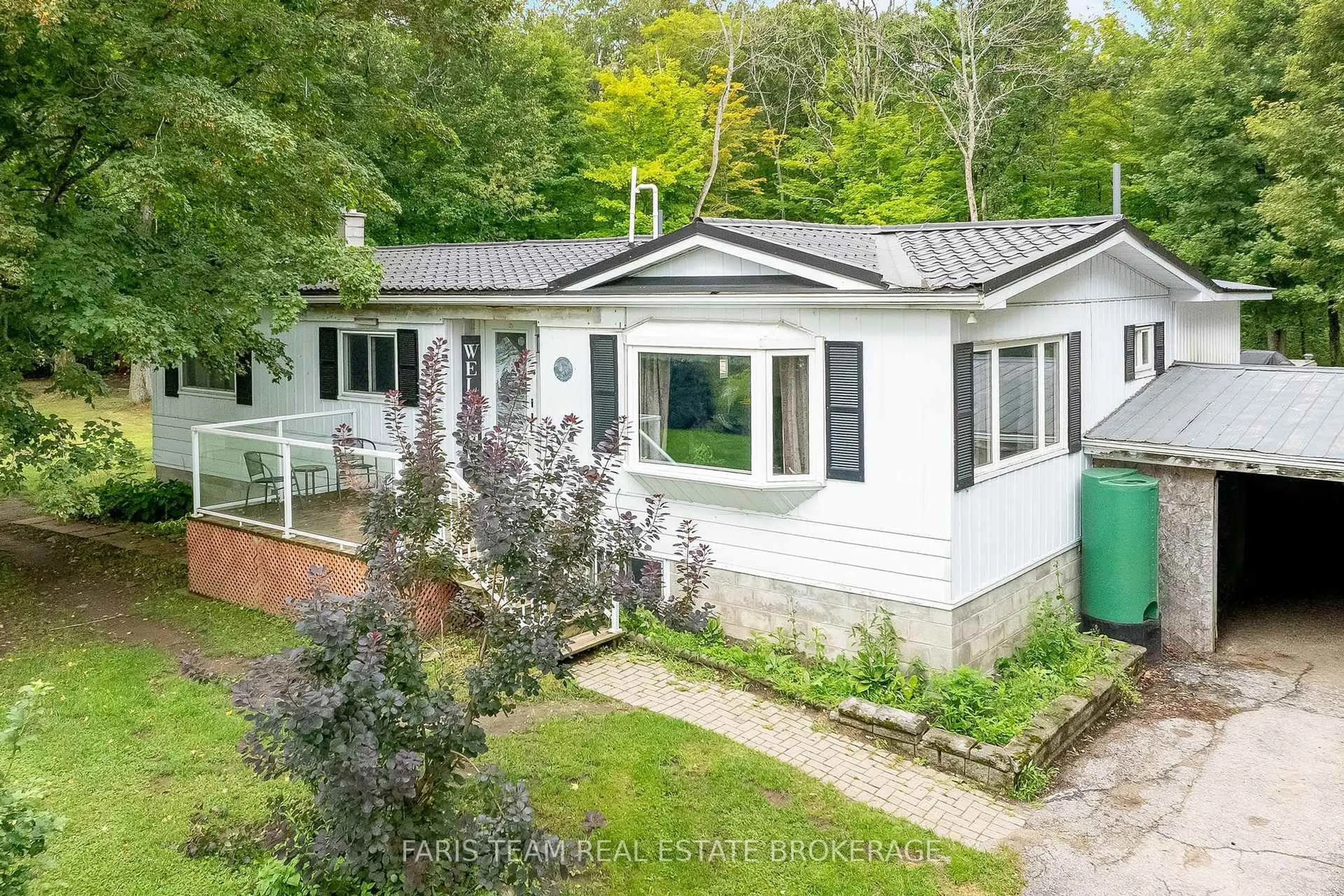 A pic from outside/outdoor area/front of a property/back of a property/a pic from drone, unknown for 1490 Laughlin Falls Rd, Severn Ontario L0K 1E0