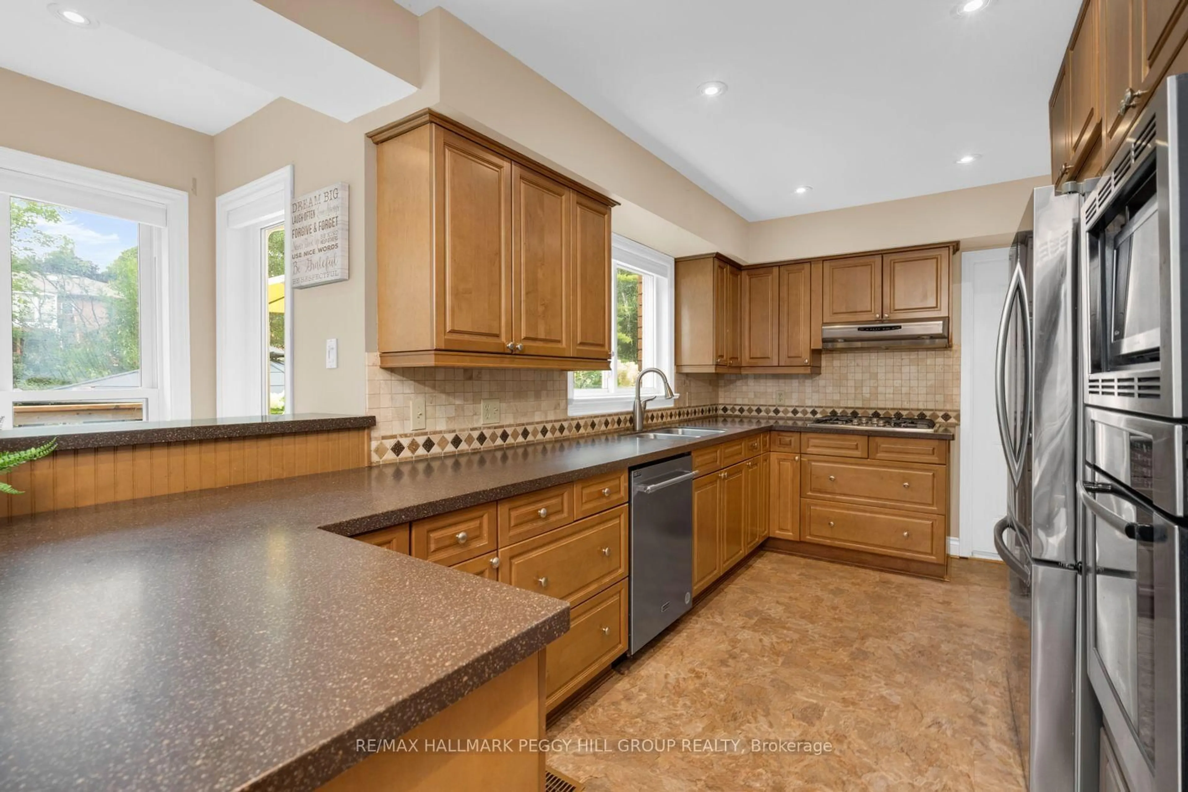 Open concept kitchen, ceramic/tile floor for 10 Rosewood Ave, Springwater Ontario L9X 0P5