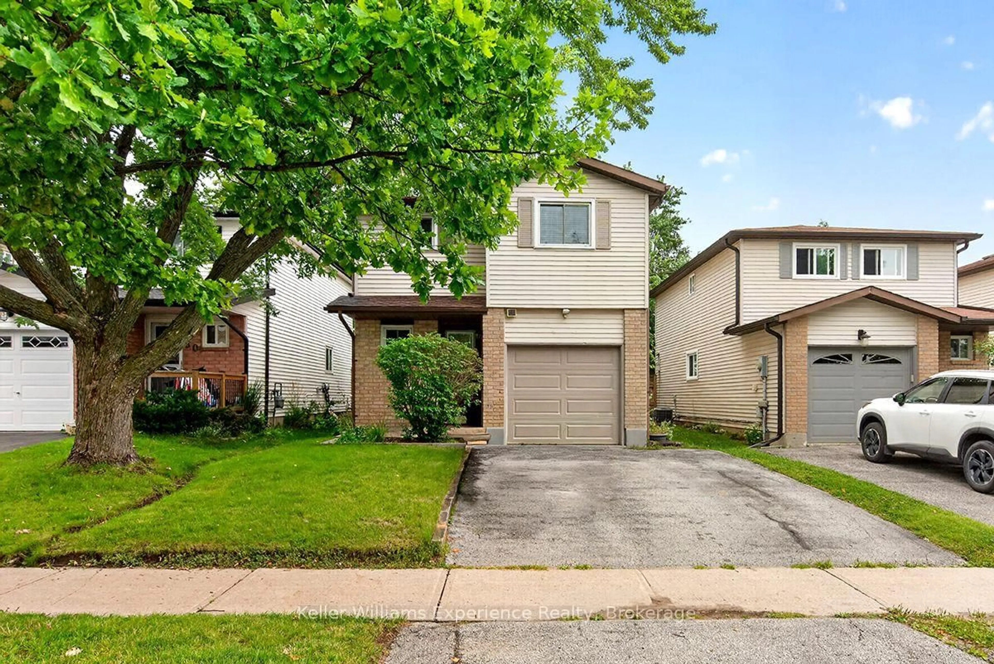 Home with brick exterior material, street for 58 Maitland Dr, Springwater Ontario L4M 5V7