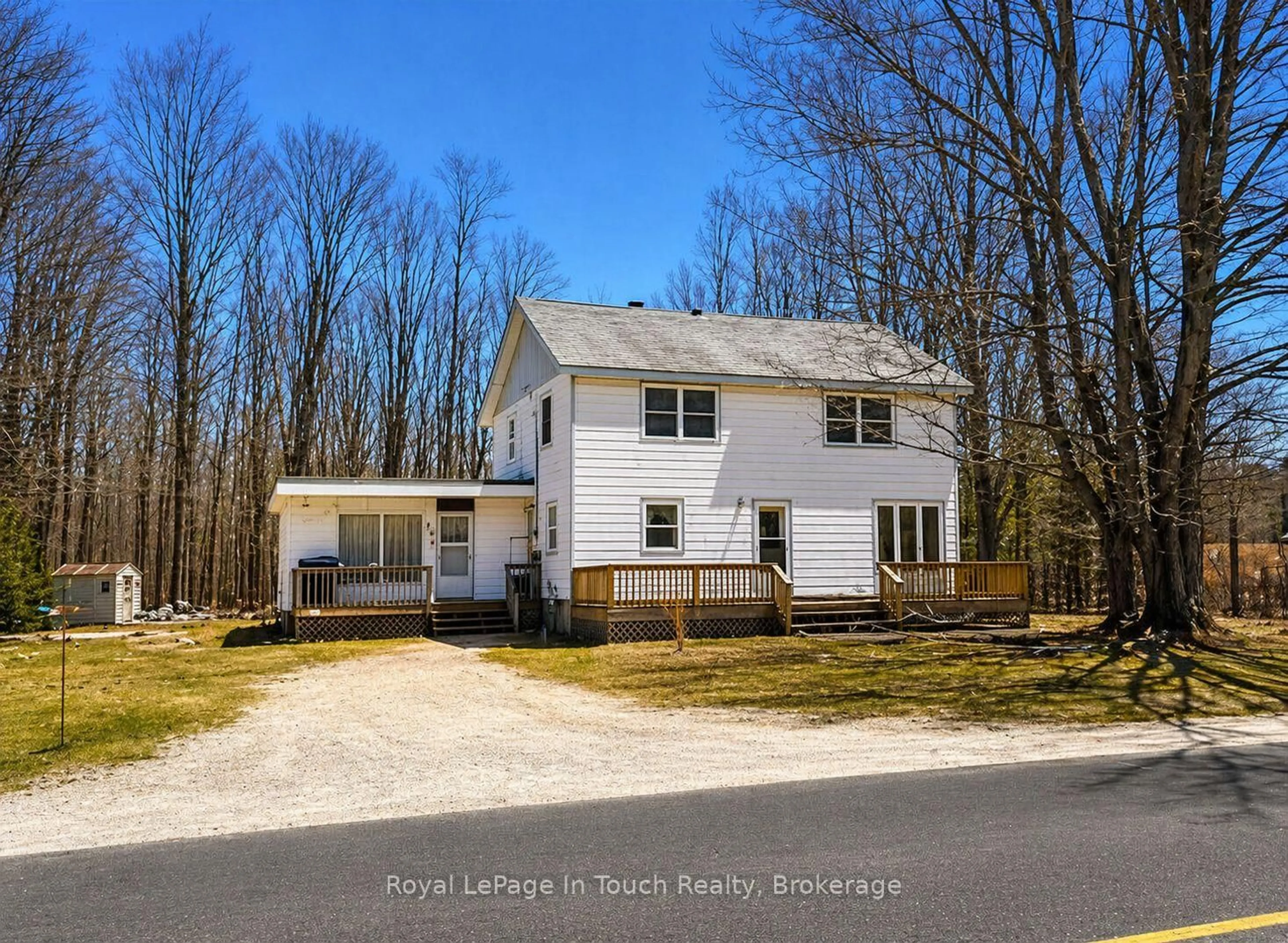 A pic from outside/outdoor area/front of a property/back of a property/a pic from drone, street for 874 Cedar Point Rd, Tiny Ontario L9M 0K1