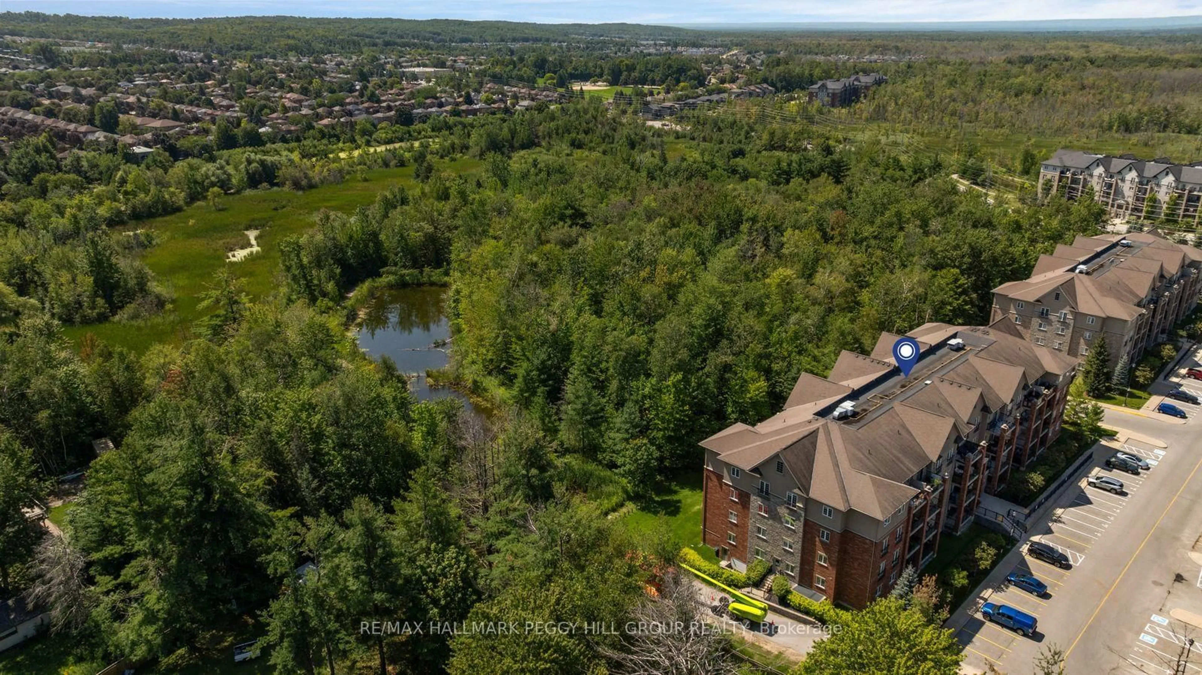 A pic from outside/outdoor area/front of a property/back of a property/a pic from drone, water/lake/river/ocean view for 43 Ferndale Dr #302, Barrie Ontario L4N 5W6