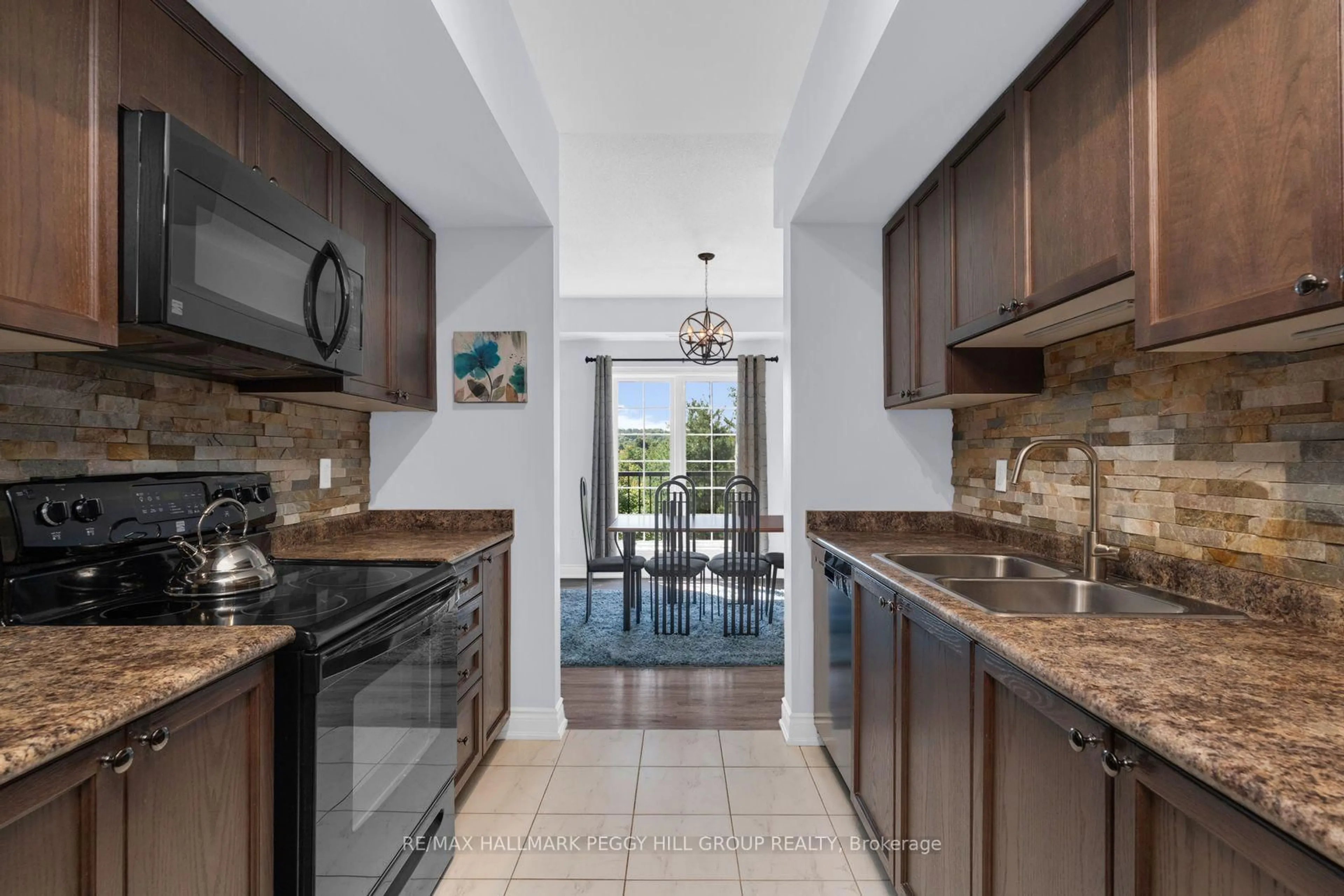 Open concept kitchen, ceramic/tile floor for 43 Ferndale Dr #302, Barrie Ontario L4N 5W6