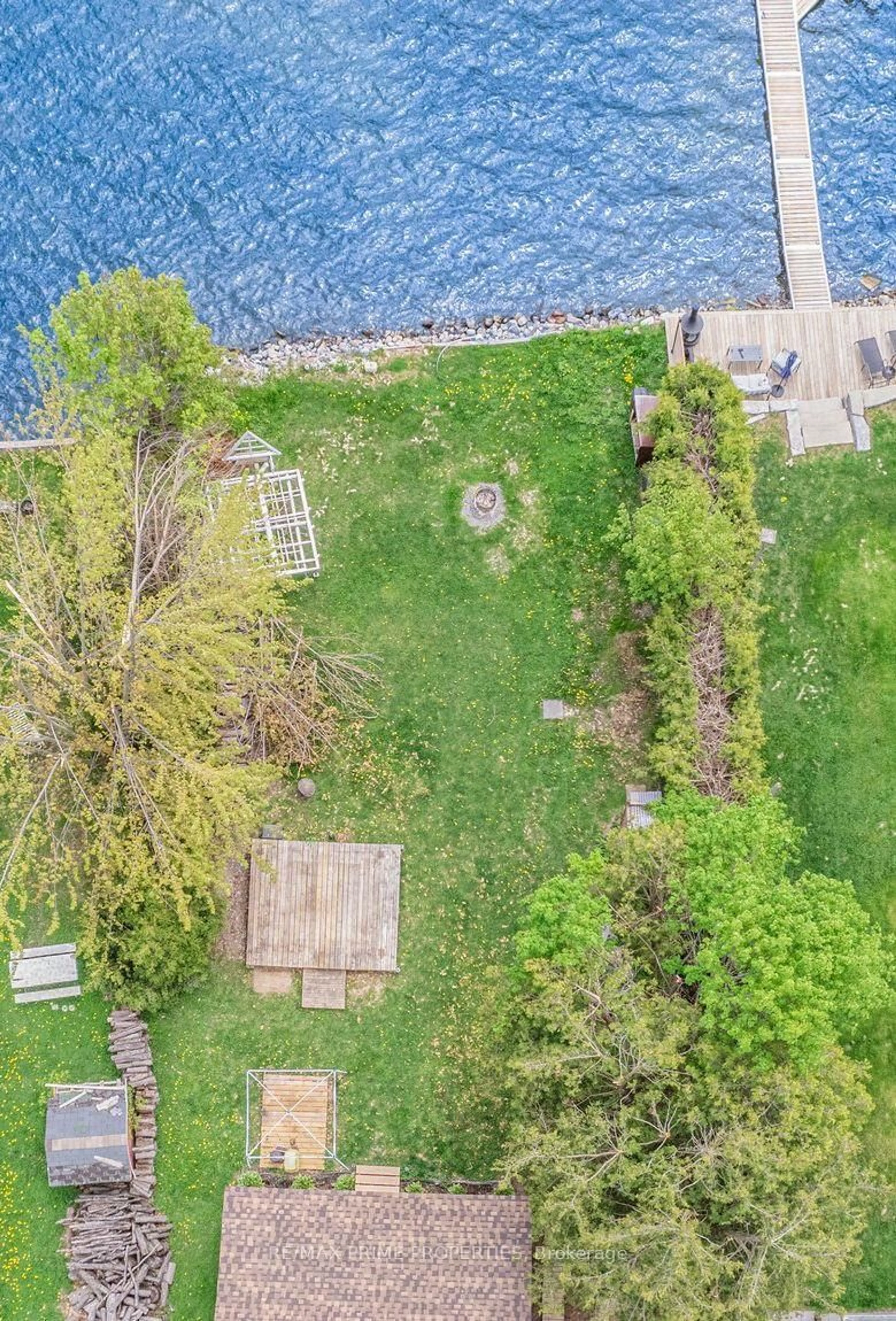 A pic from outside/outdoor area/front of a property/back of a property/a pic from drone, water/lake/river/ocean view for 1947 Woods Bay Rd, Severn Ontario L3V 6H3