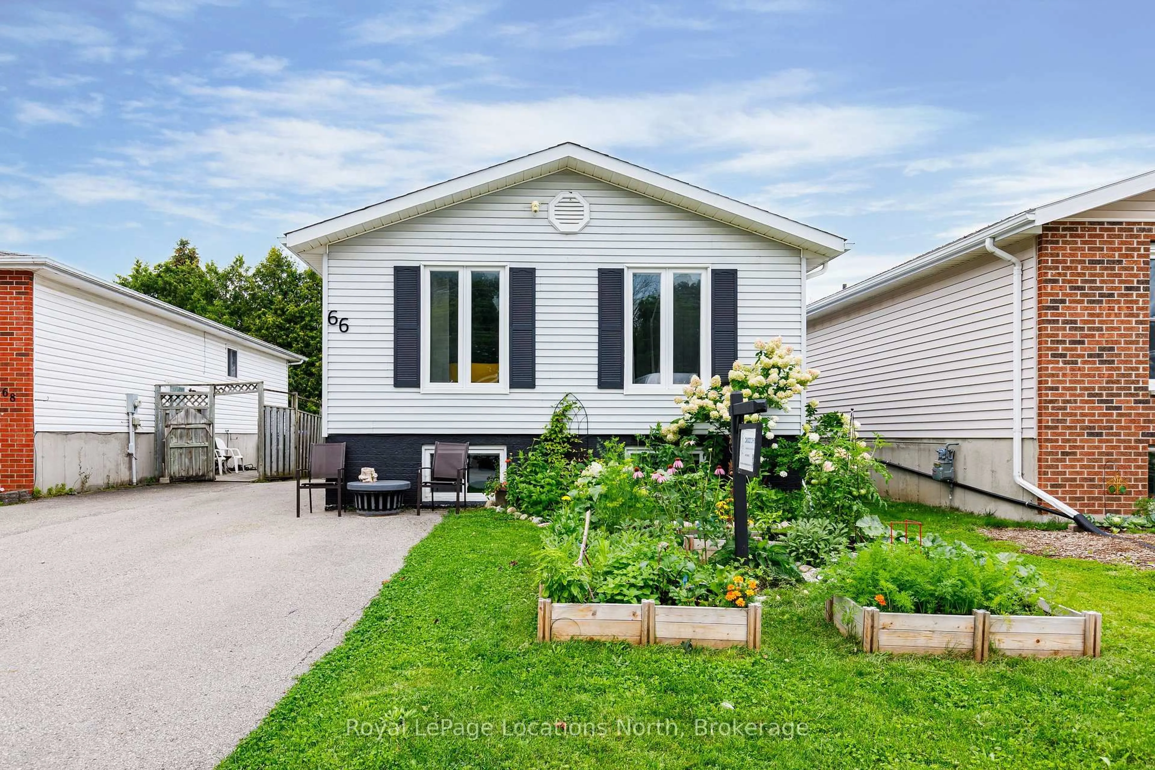 Home with vinyl exterior material, street for 66 Telfer Rd, Collingwood Ontario L9Y 4S2