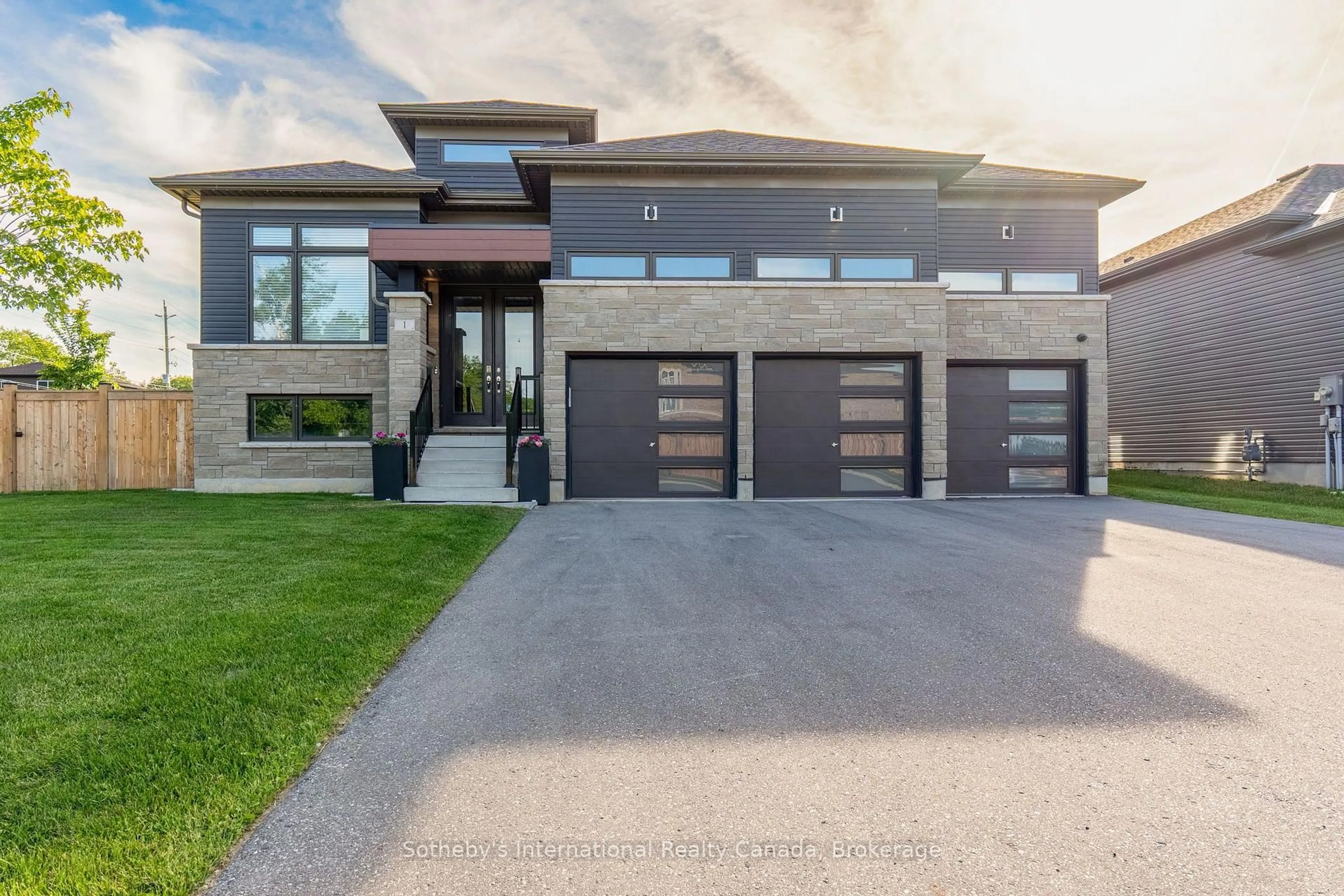 Home with brick exterior material, street for 1 Chiara Dr, Wasaga Beach Ontario L9Z 0L5