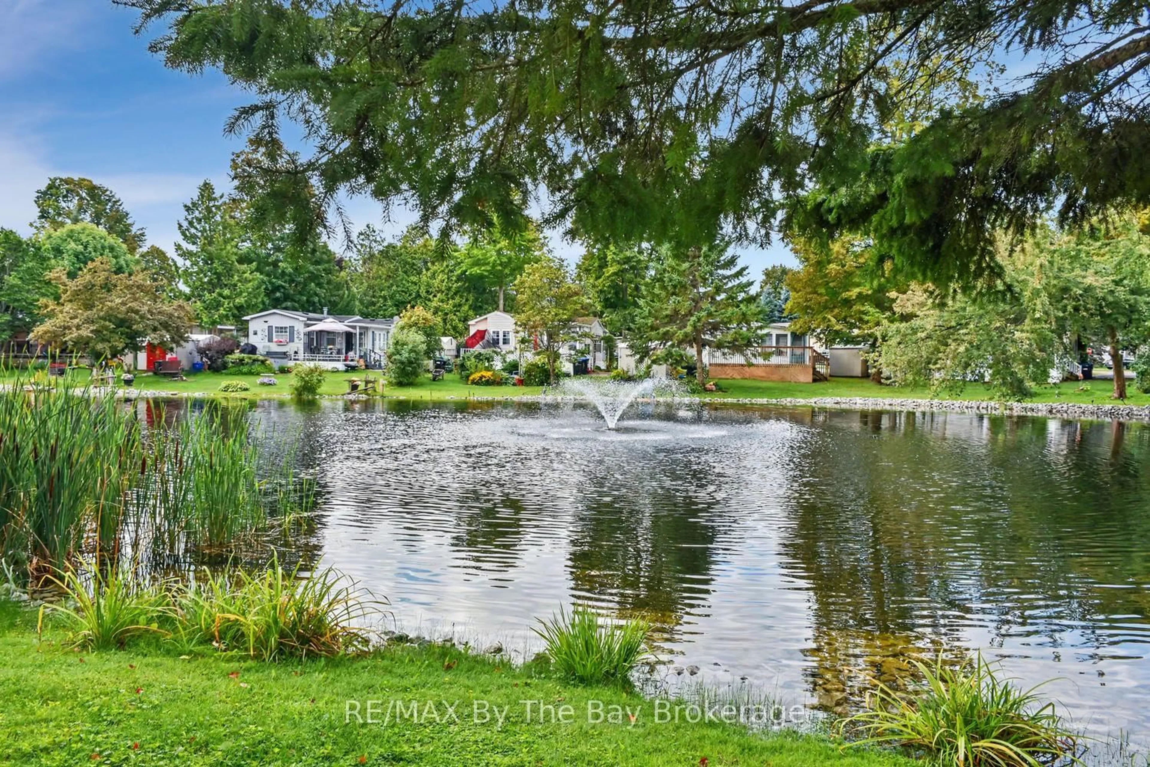 A pic from outside/outdoor area/front of a property/back of a property/a pic from drone, water/lake/river/ocean view for 54 The Board Walk, Wasaga Beach Ontario L9Z 3A8