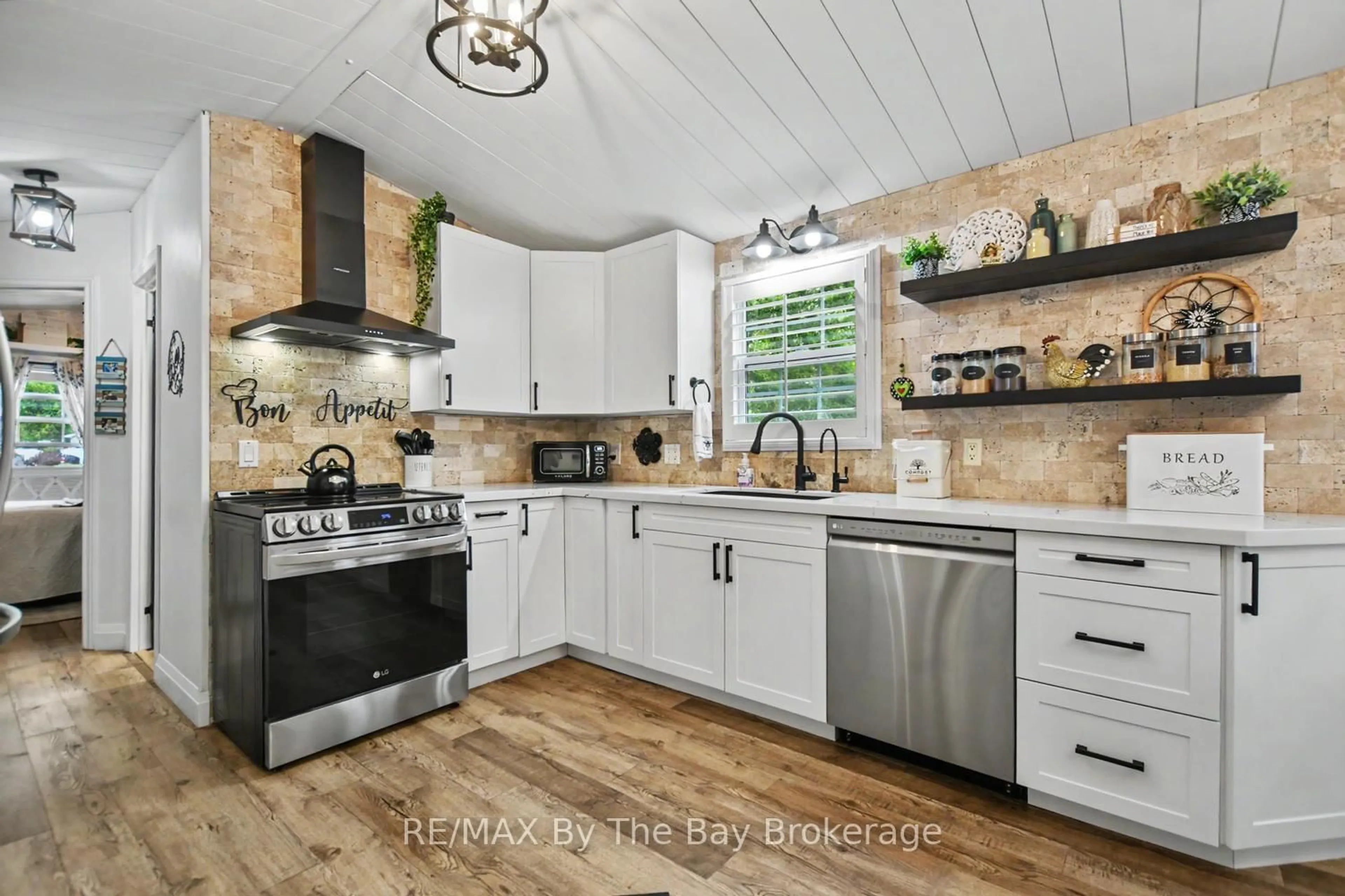 Open concept kitchen, ceramic/tile floor for 54 The Board Walk, Wasaga Beach Ontario L9Z 3A8