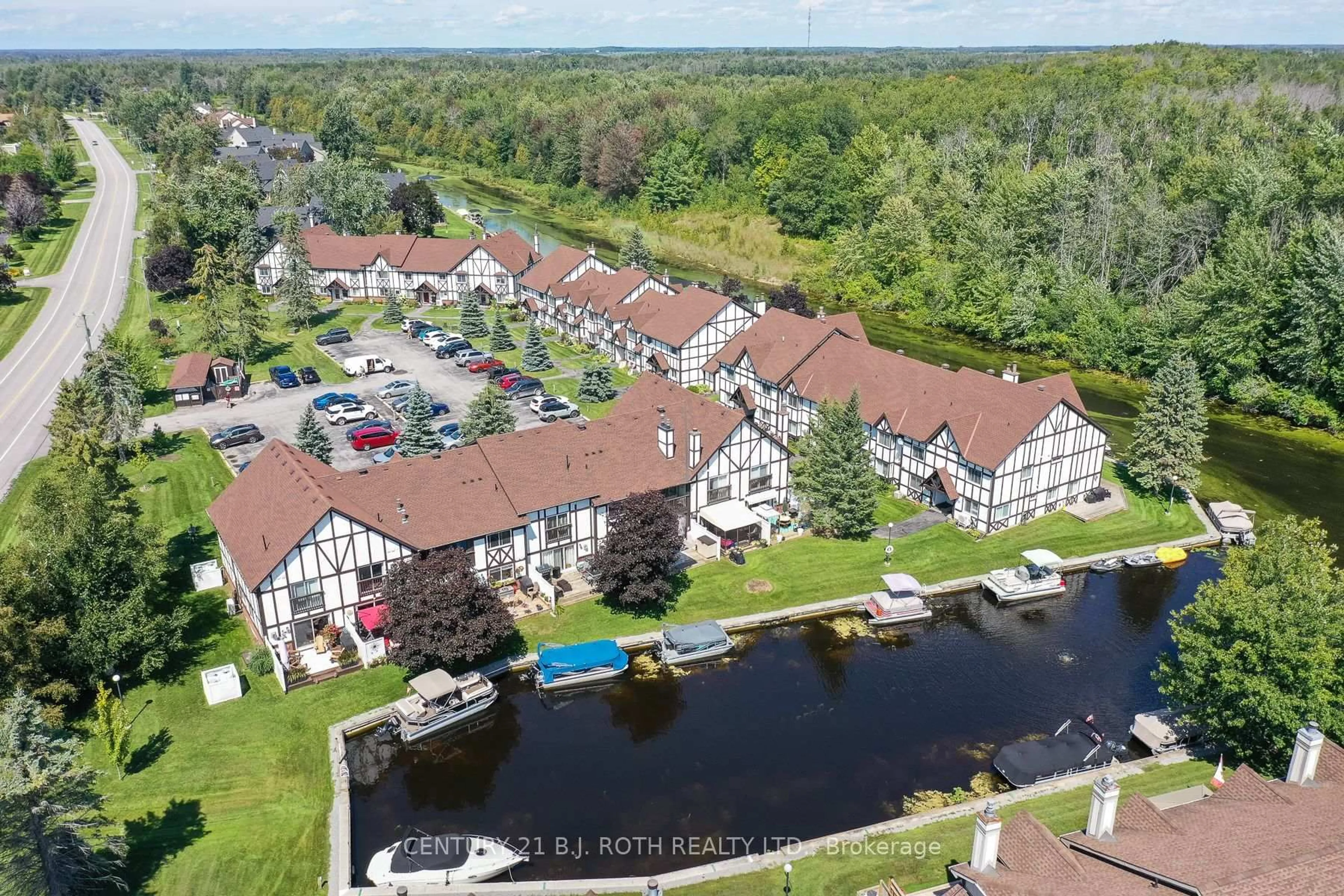 A pic from outside/outdoor area/front of a property/back of a property/a pic from drone, water/lake/river/ocean view for 31 Laguna Pkwy #Unit 33, Ramara Ontario L0K 1B0