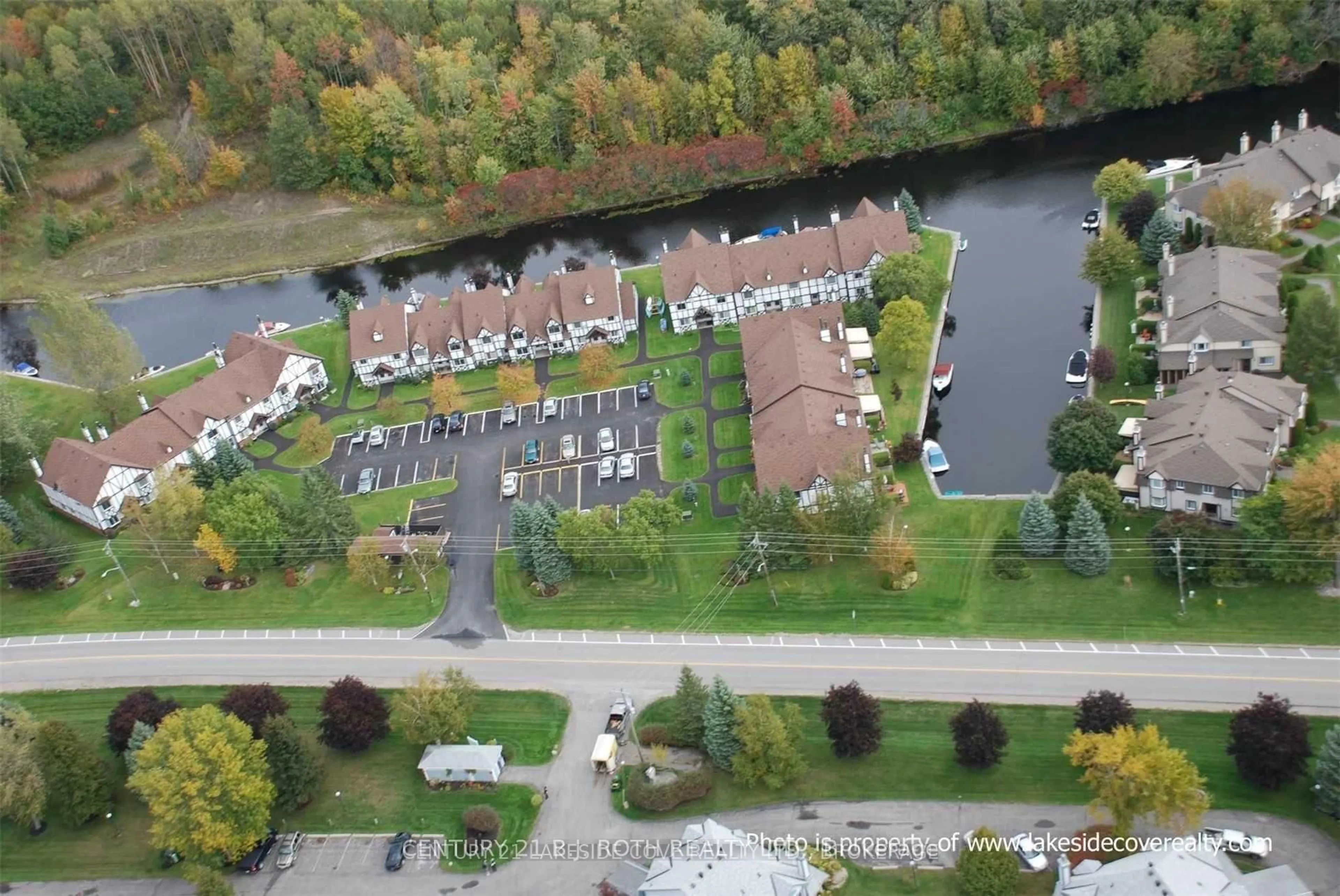 A pic from outside/outdoor area/front of a property/back of a property/a pic from drone, water/lake/river/ocean view for 31 Laguna Pkwy #Unit 33, Ramara Ontario L0K 1B0
