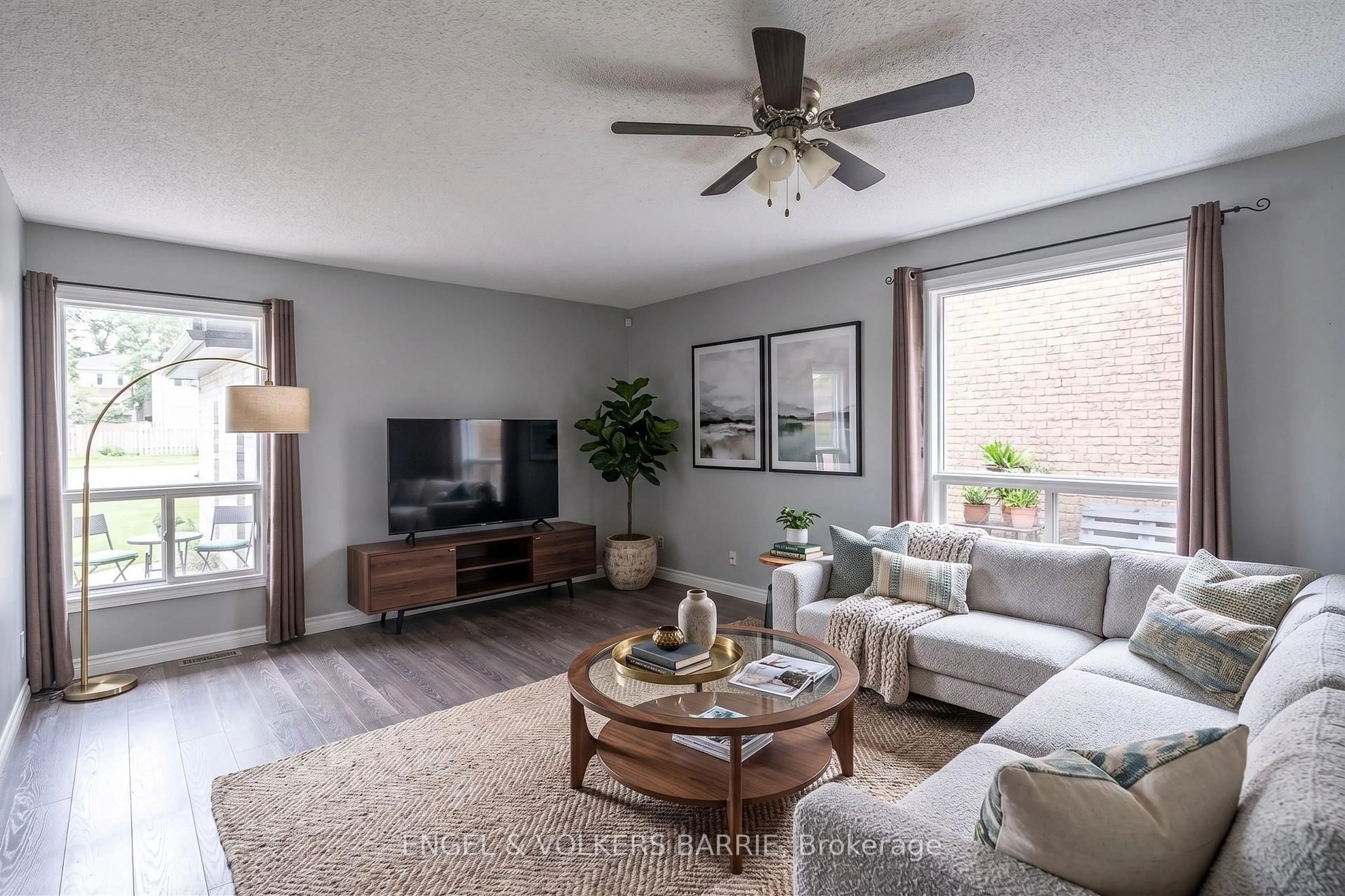 Living room with furniture, wood/laminate floor for 94 Ferguson Dr, Barrie Ontario L4N 7E5