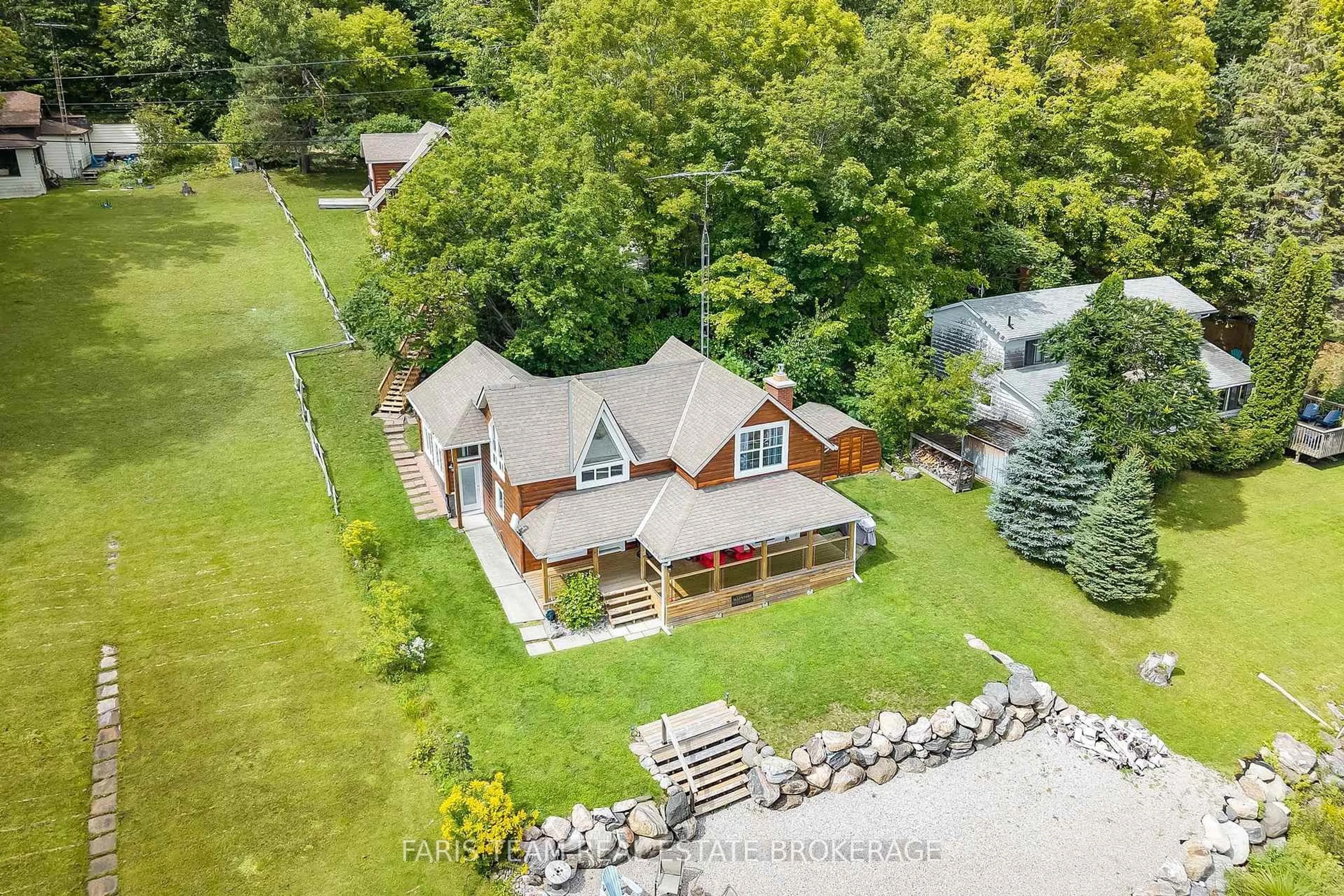 A pic from outside/outdoor area/front of a property/back of a property/a pic from drone, water/lake/river/ocean view for 375 Champlain Rd, Penetanguishene Ontario L9M 1S3