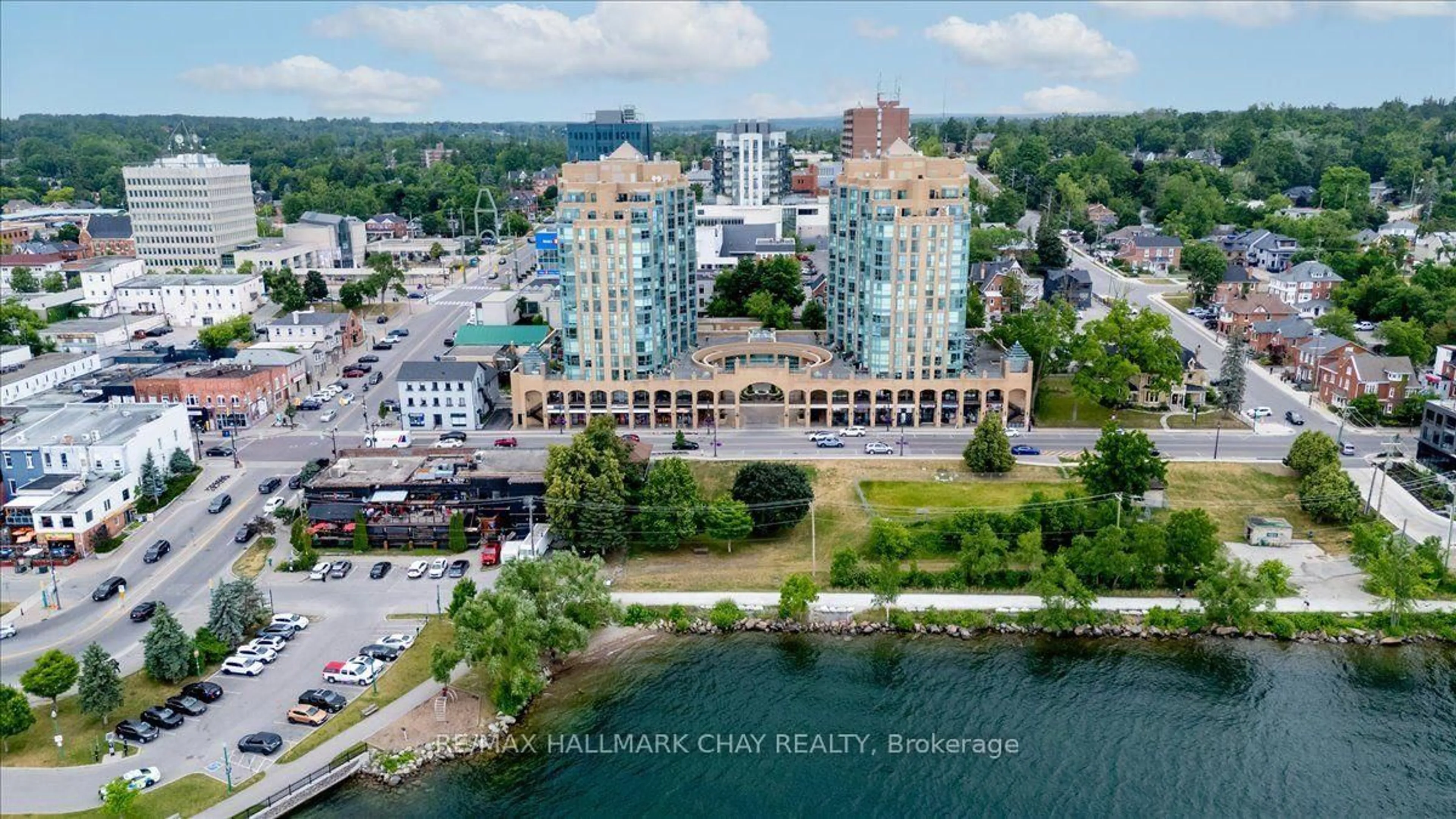 A pic from outside/outdoor area/front of a property/back of a property/a pic from drone, water/lake/river/ocean view for 140 Dunlop St #407, Barrie Ontario L4M 6H9