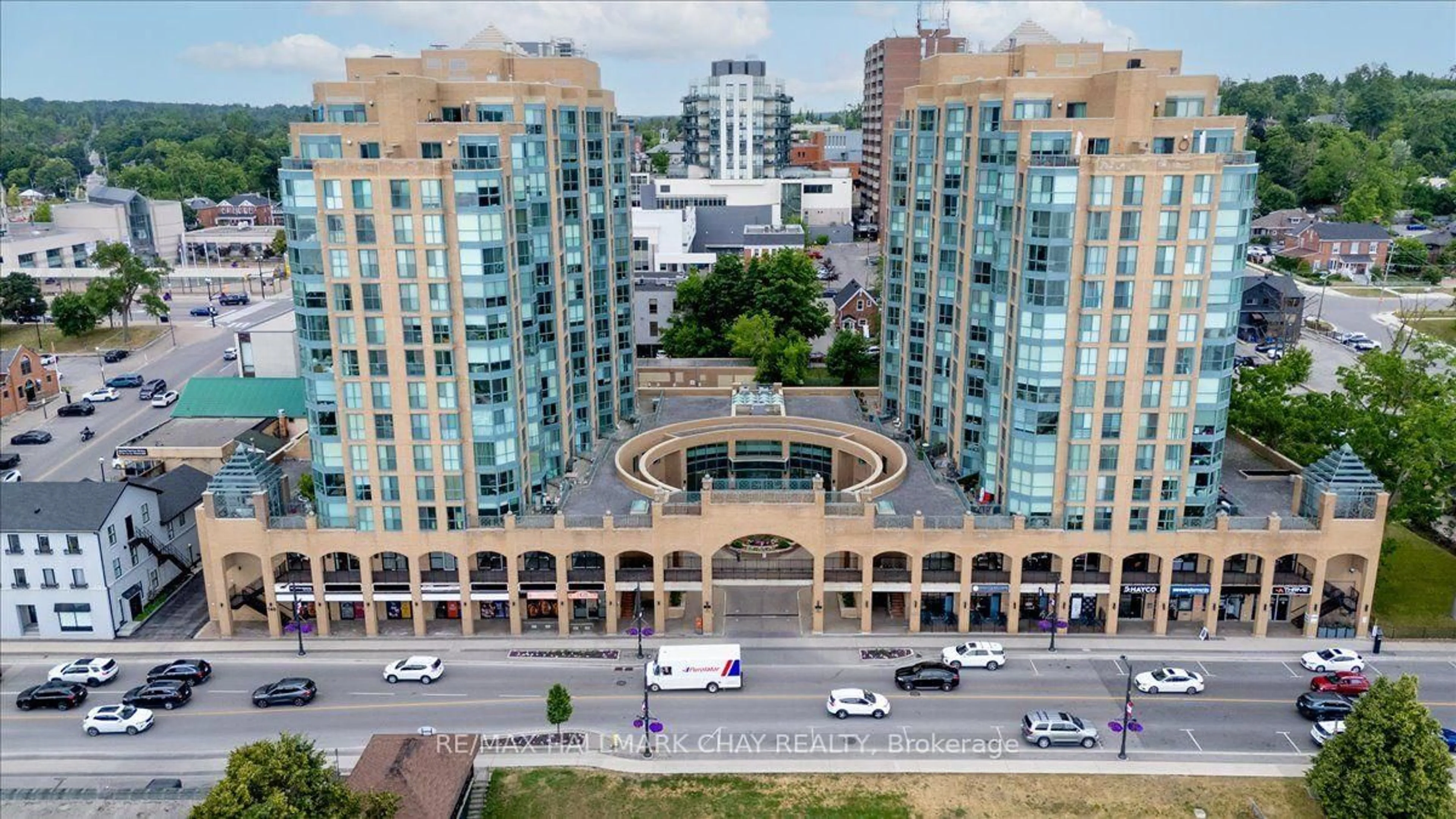 A pic from outside/outdoor area/front of a property/back of a property/a pic from drone, city buildings view from balcony for 140 Dunlop St #407, Barrie Ontario L4M 6H9