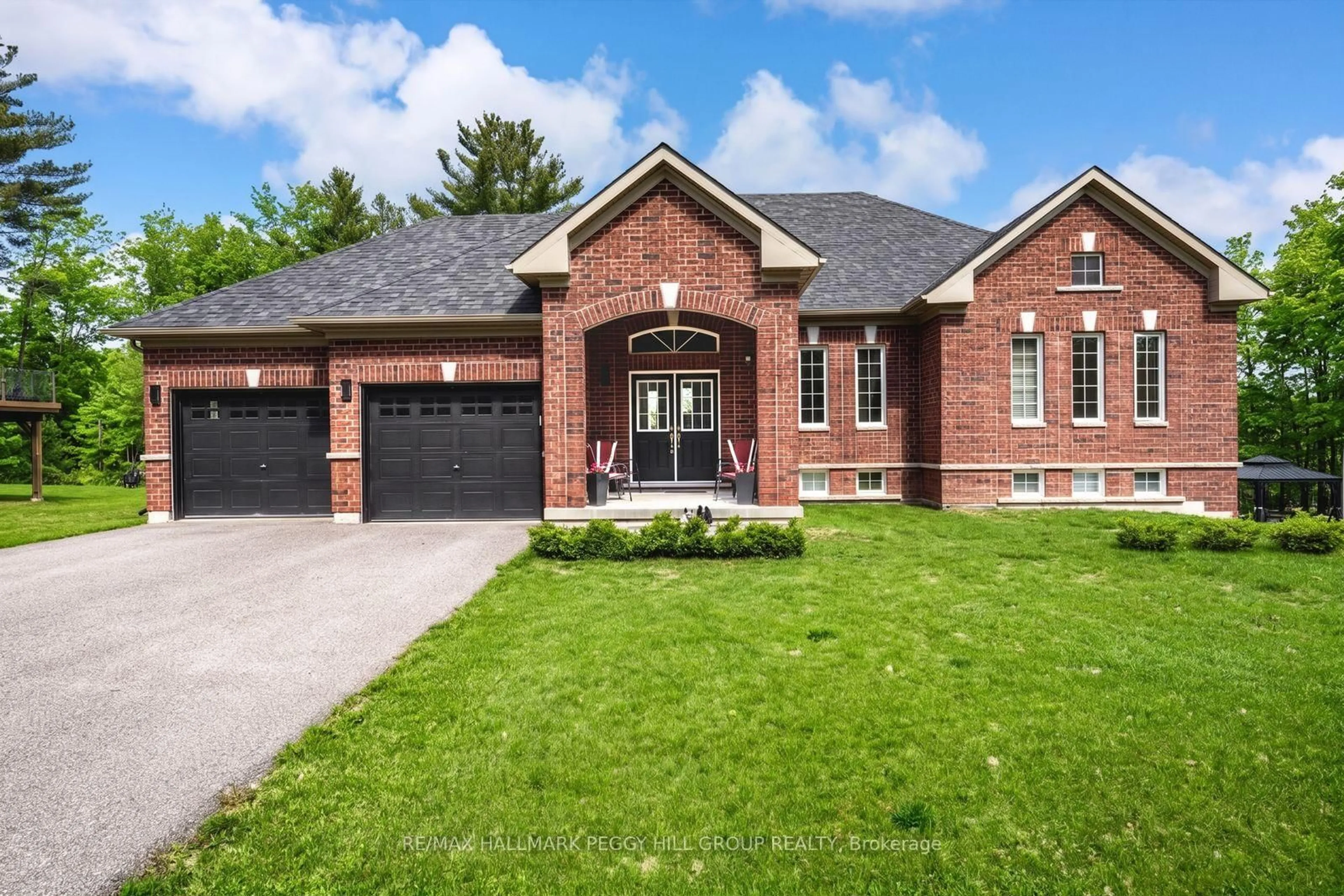 Home with brick exterior material, street for 82 Diamond Valley Dr, Oro-Medonte Ontario L0L 2E0
