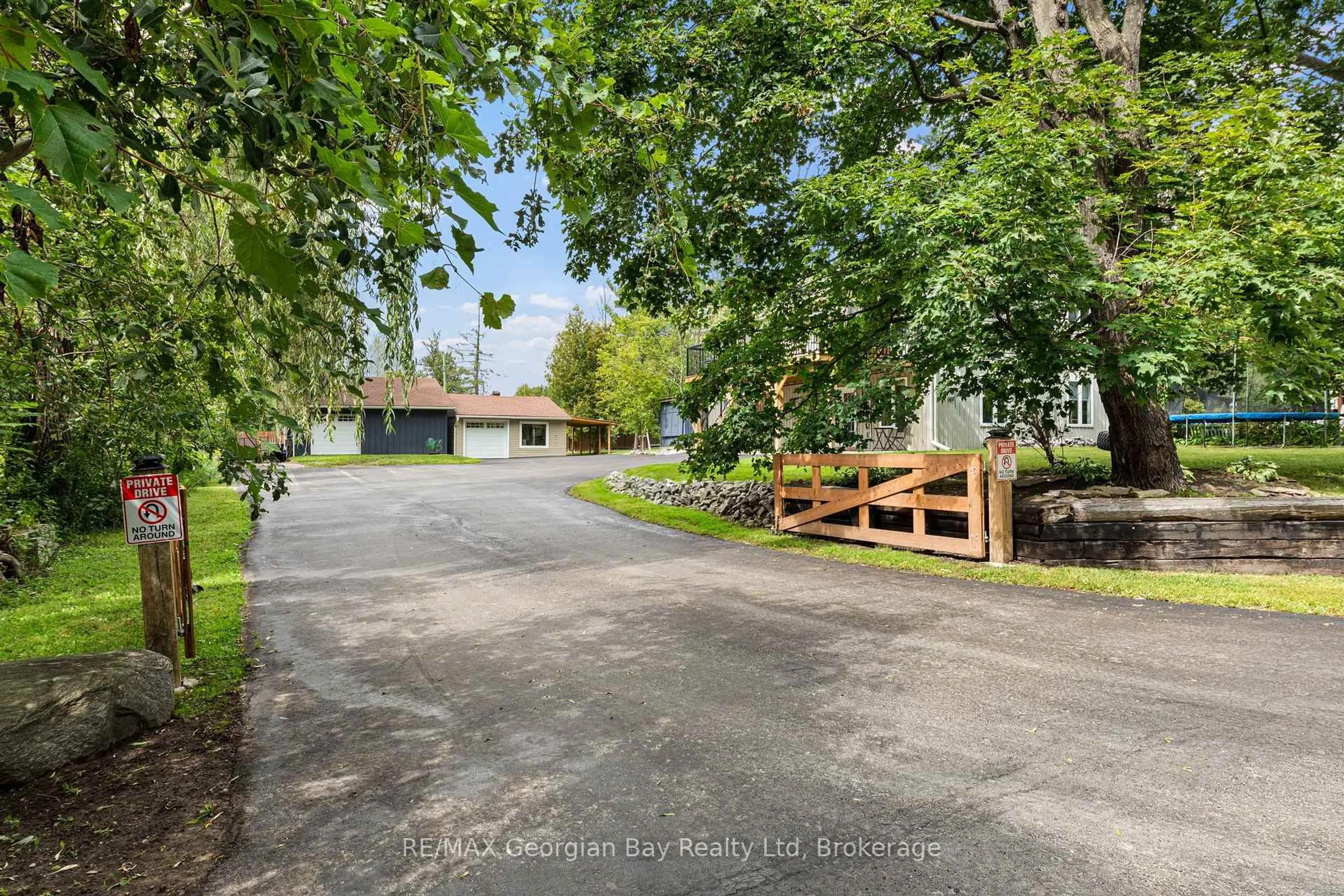 A pic from outside/outdoor area/front of a property/back of a property/a pic from drone, street for 2384 Whetham Rd, Springwater Ontario L0L 1P0