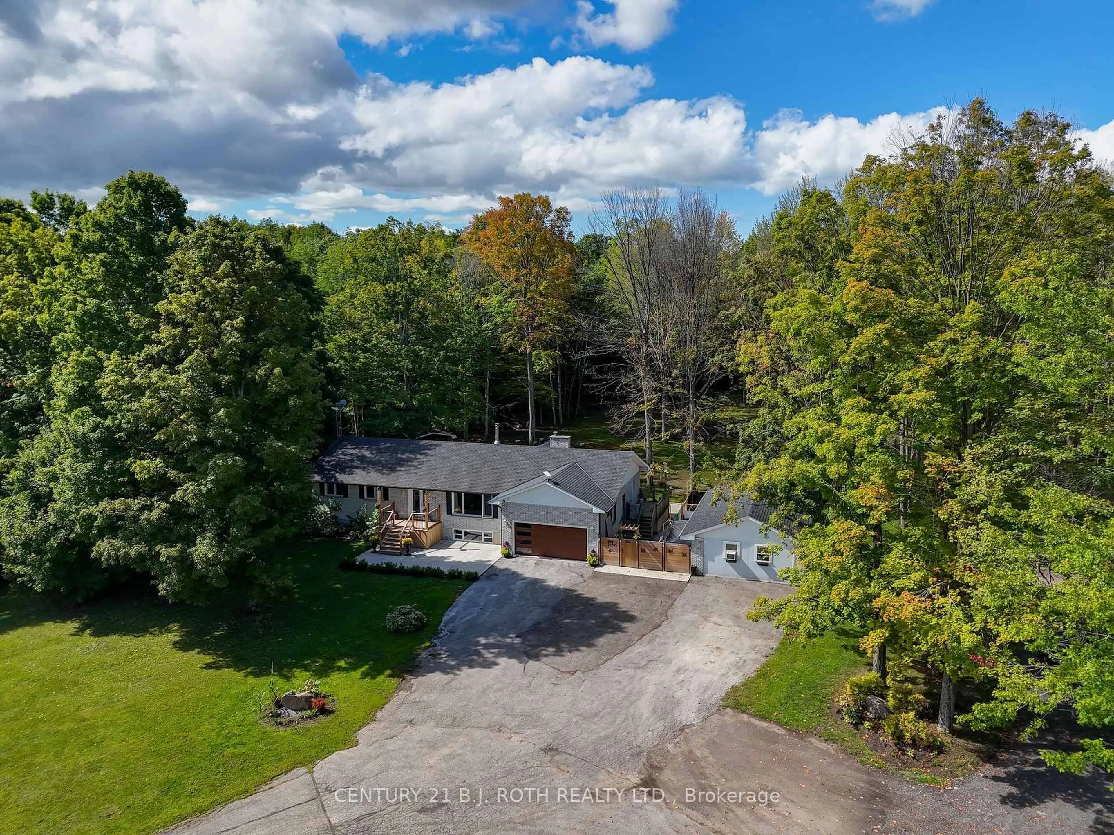 A pic from outside/outdoor area/front of a property/back of a property/a pic from drone, water/lake/river/ocean view for 1250 County Road 6, Tiny Ontario L0L 2T0